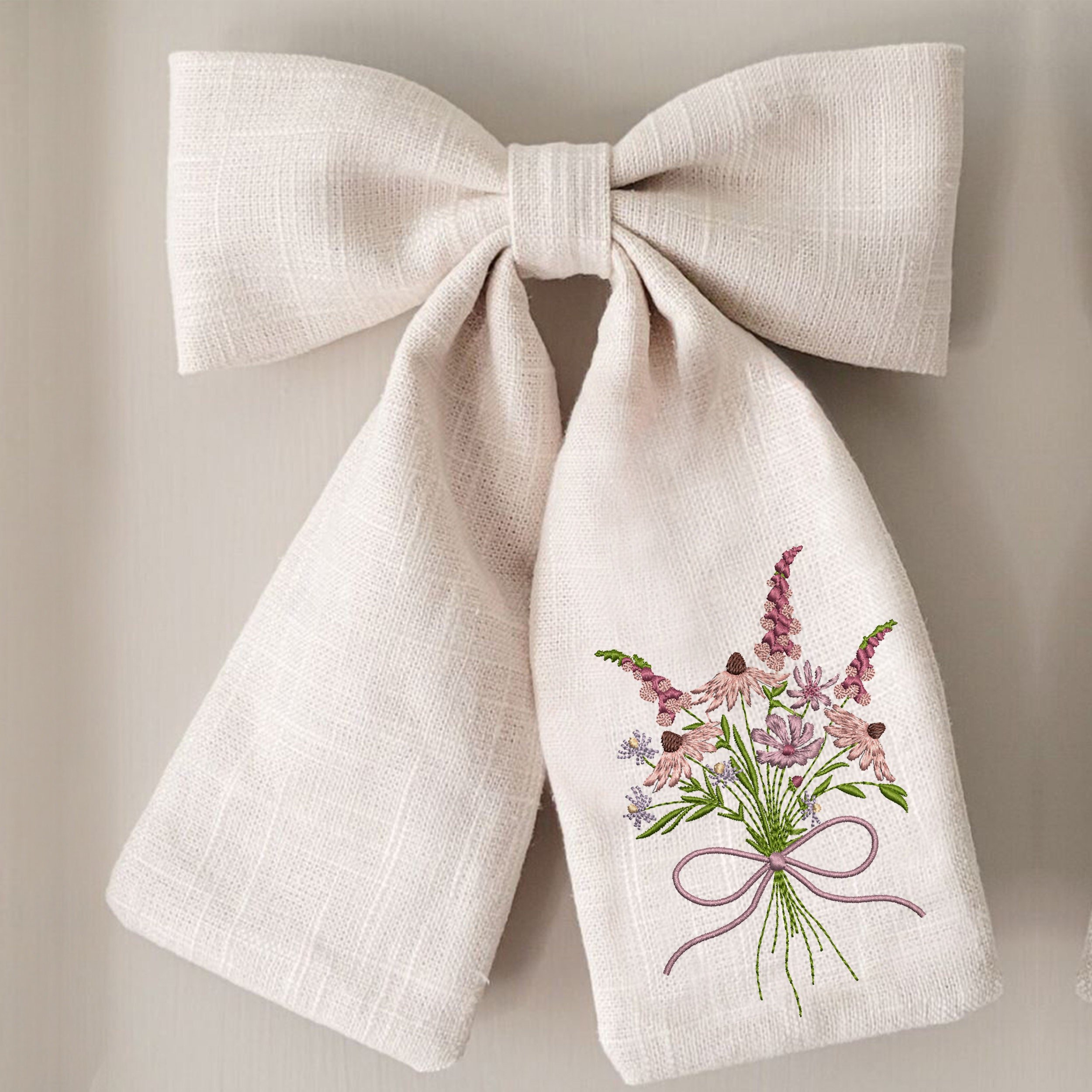 Coneflower and Foxglove Flower Bouquet Machine Embroidery Design embroidered on a bow