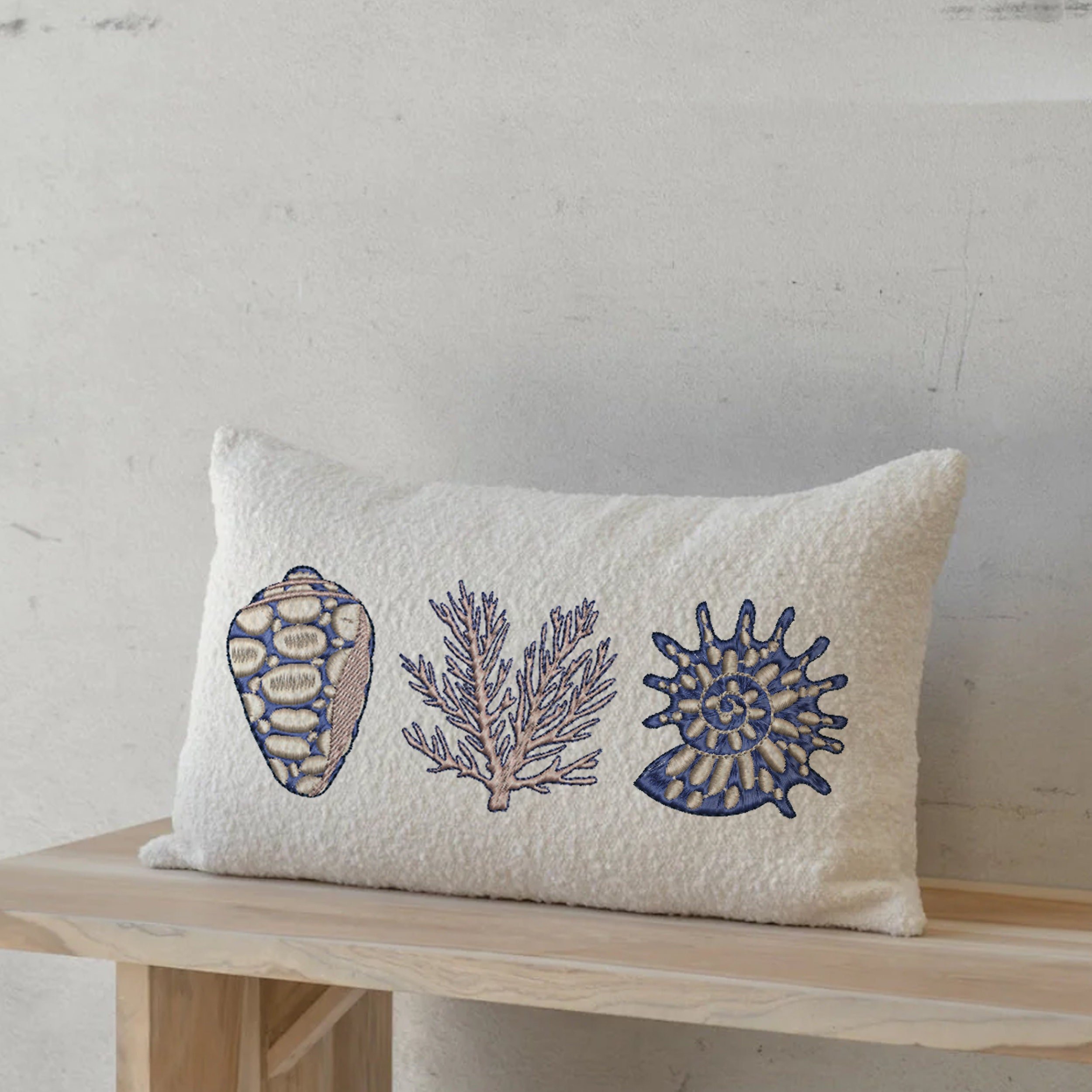 Chinoiserie Seashell Machine Embroidery Designs embroidered on a pillow