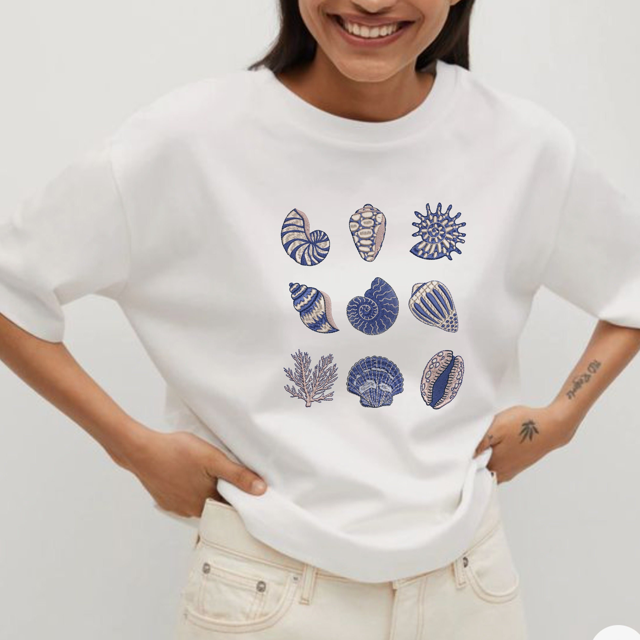 Chinoiserie Seashell Machine Embroidery Designs embroidered on a t-shirt