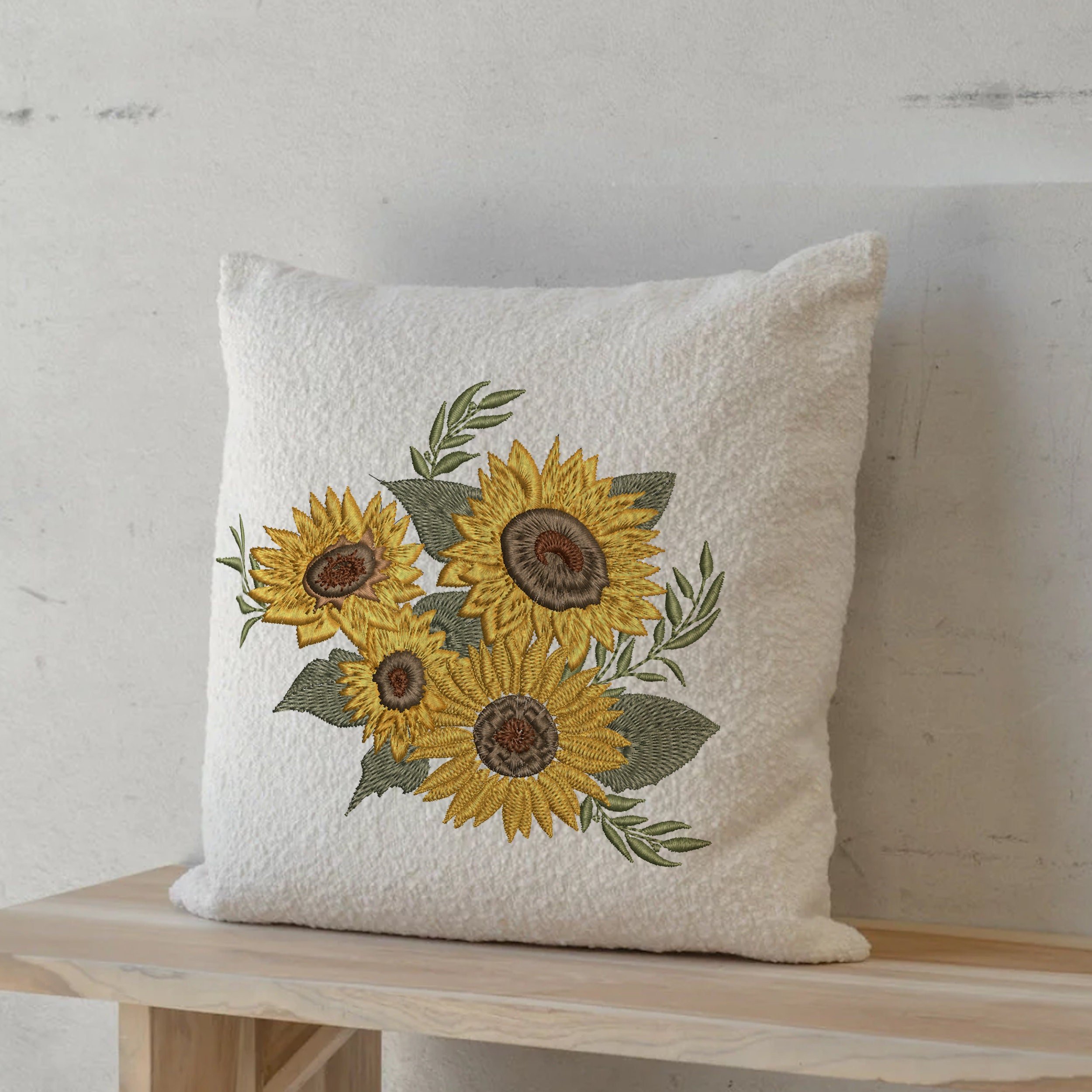 Sunflower Border and Bouquet Machine Embroidery Design File Bundle embroidered on a square pillow