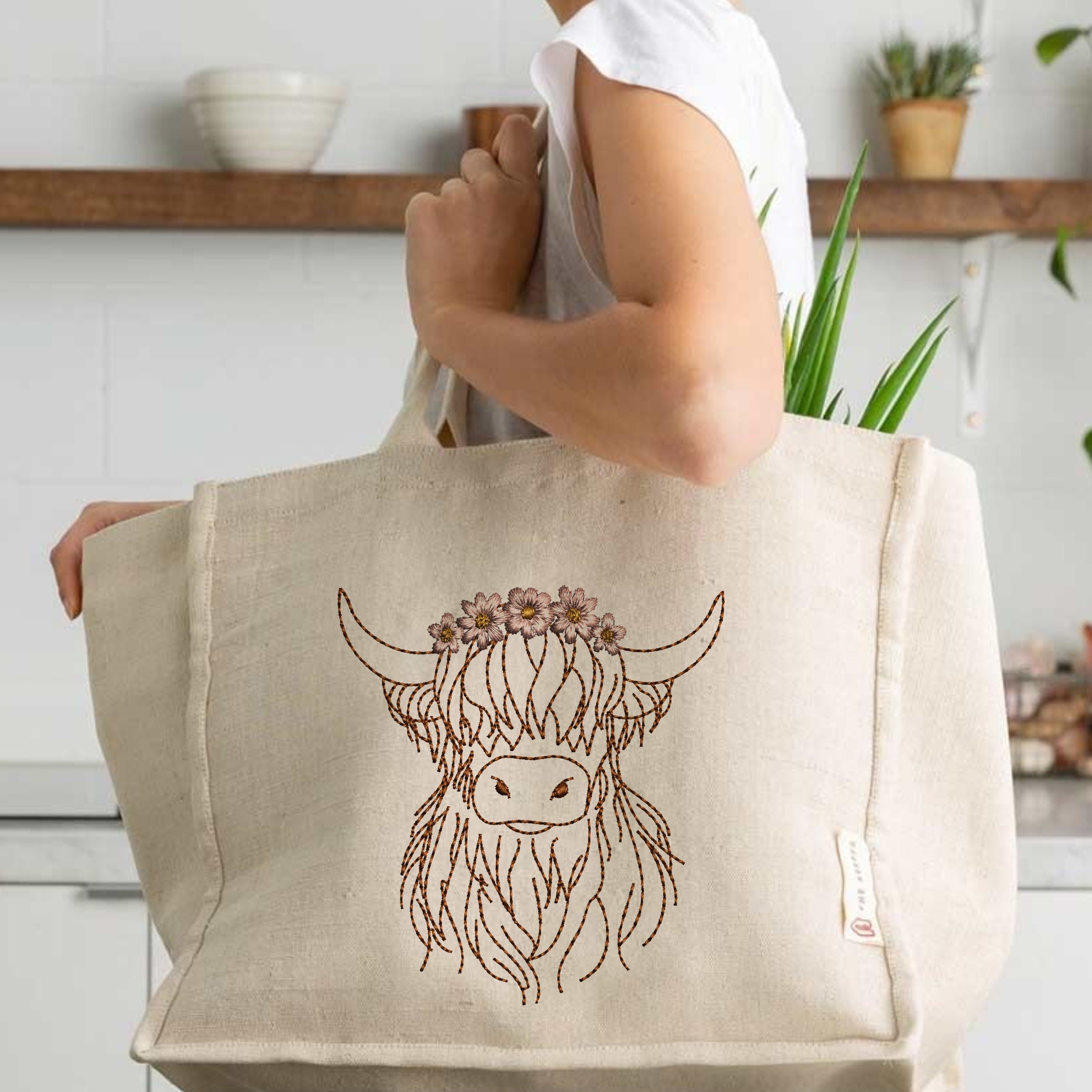 Highland Scottish Cow Machine Embroidery Design File embroidered on a shopping bag