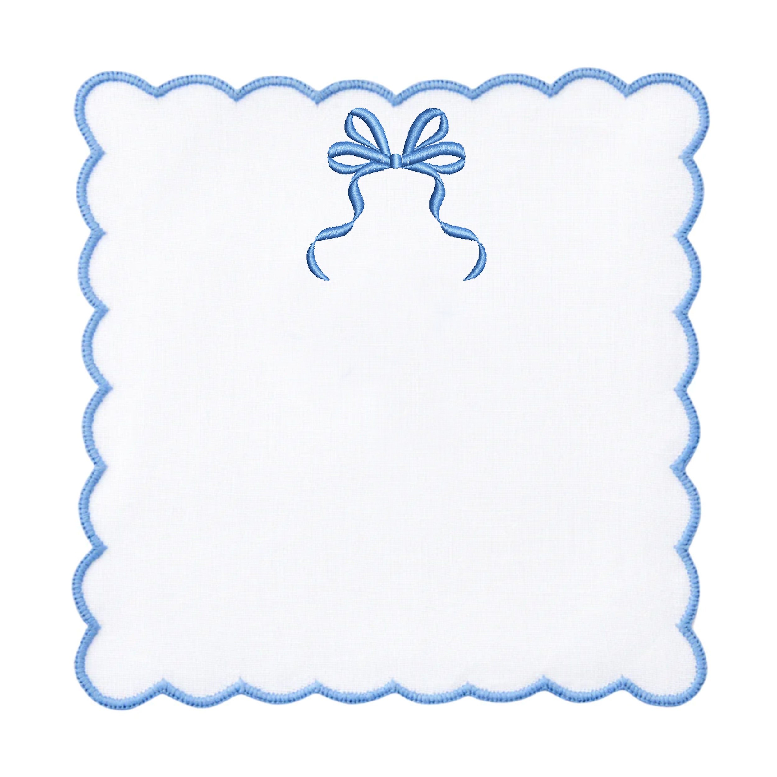 Chinoiserie Blue and White Bow Collection Machine Embroidery Design embroidered on a napkin