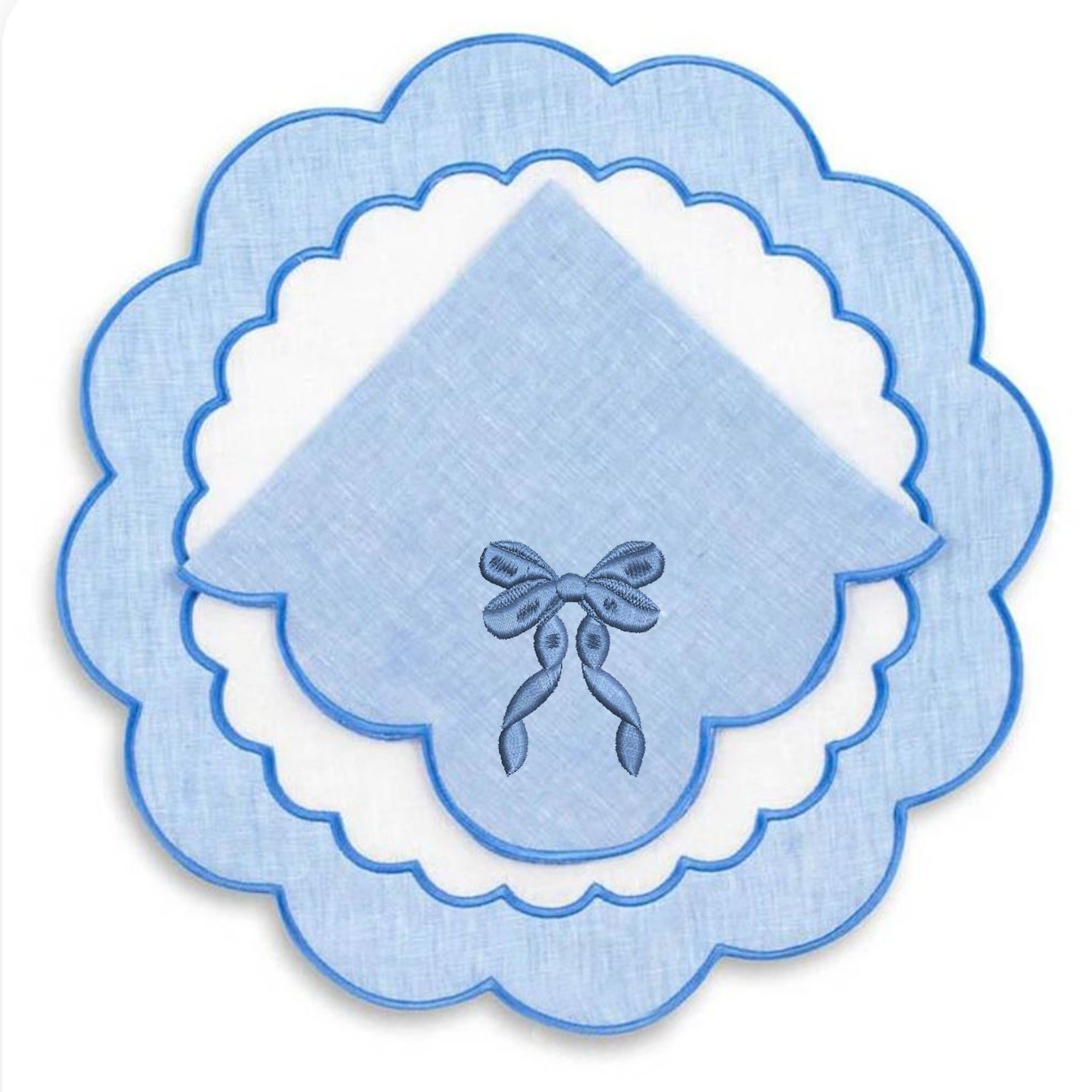 Chinoiserie Blue and White Bow Collection Machine Embroidery Design embroidered on a cocktail napkin