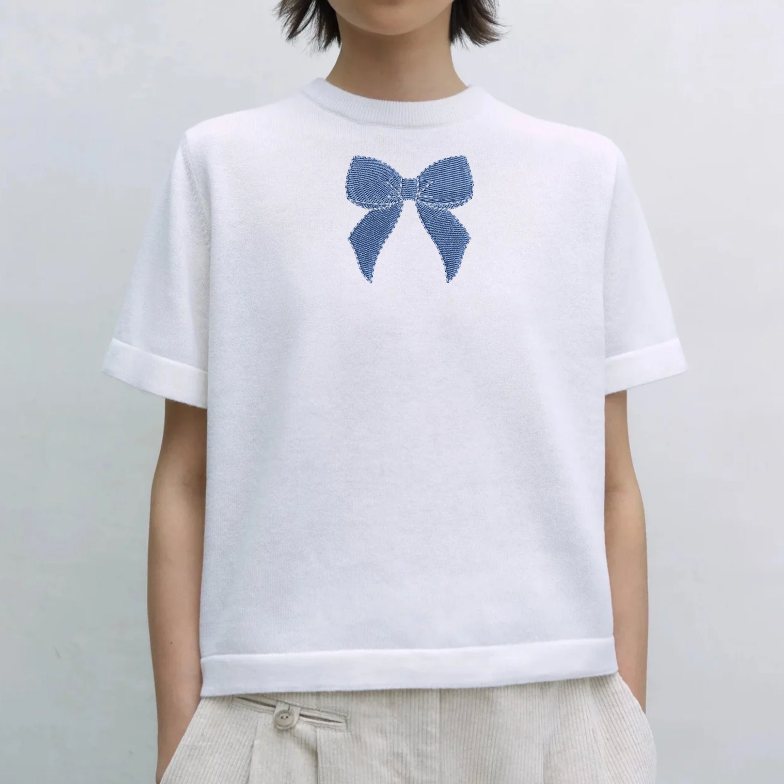 Chinoiserie Blue and White Bow Collection Machine Embroidery Design embroidered on a shirt