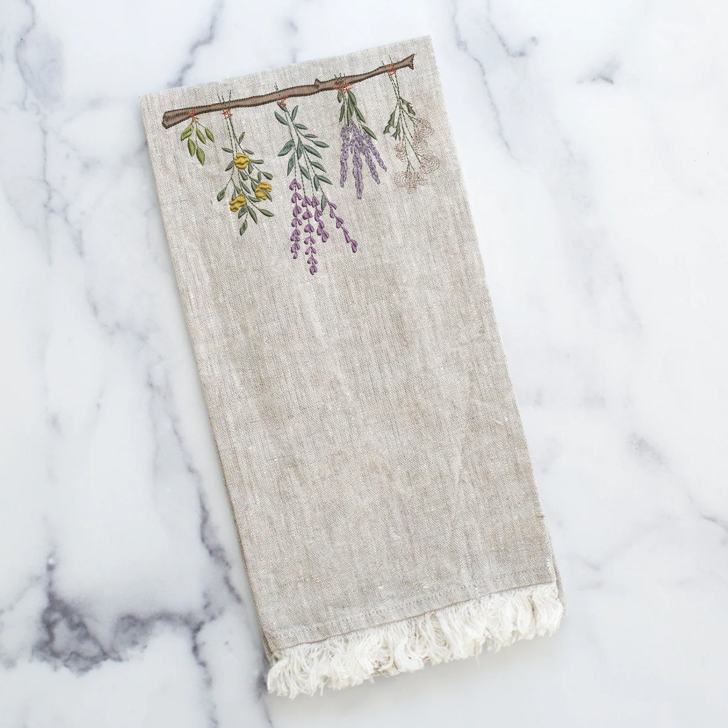 ing Herb and Wildflower Border Machine Embroidery Design File embroidered on a linen towel