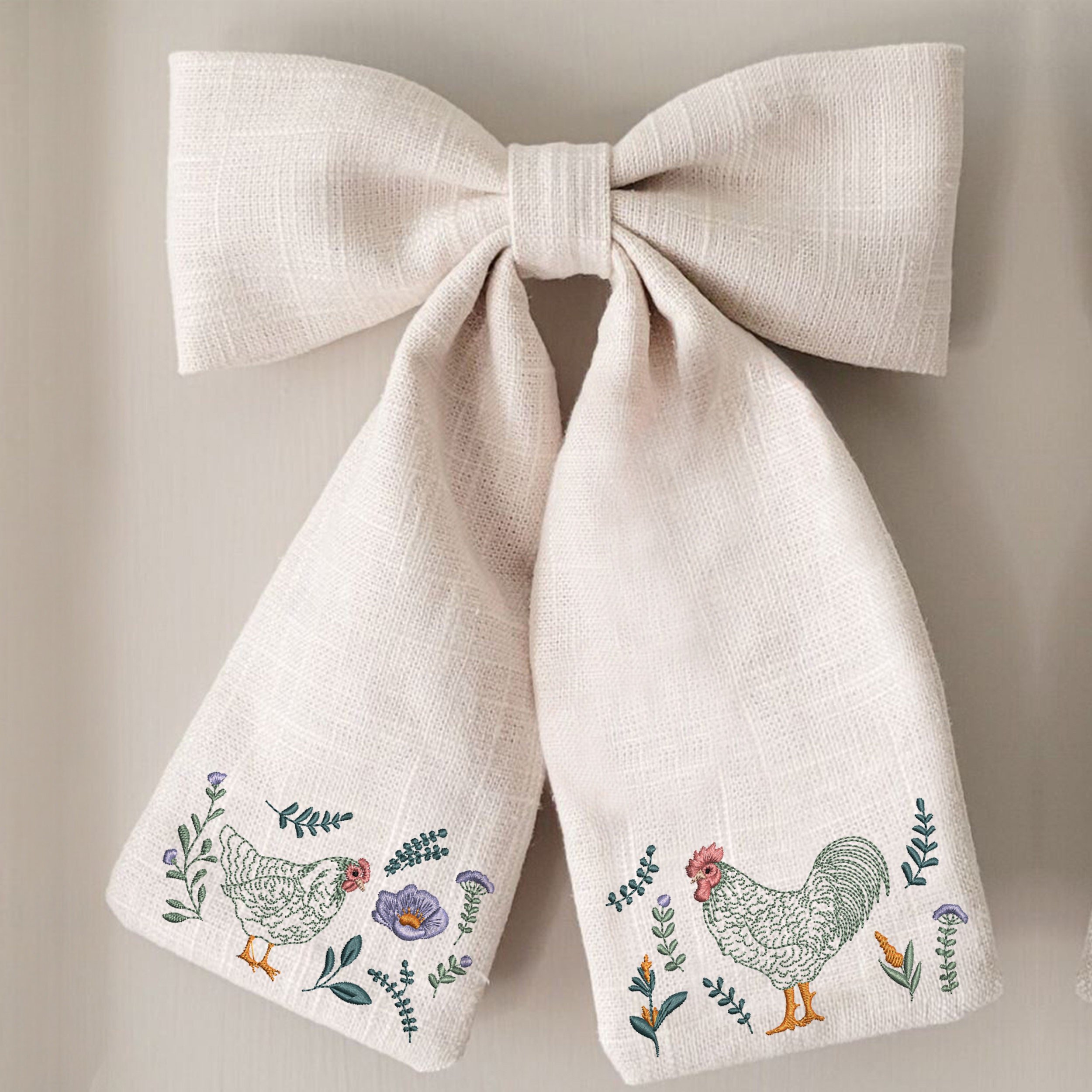 Farmhouse Flower Chicken and Rooster Machine Embroidery Design File embroidered on a bow