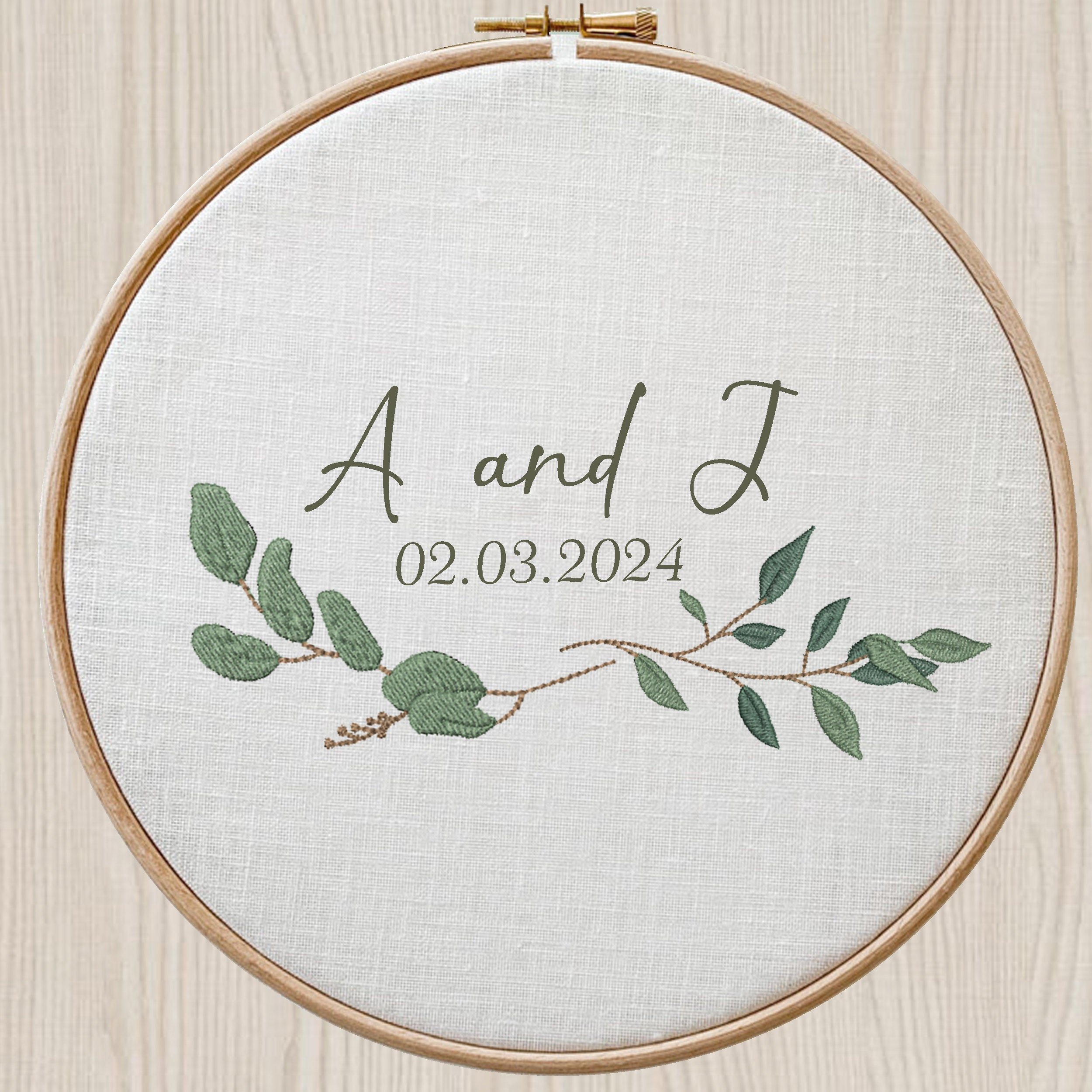 Eucalyptus Laurel Branch Machine Embroidery Design embroidered on a hoop