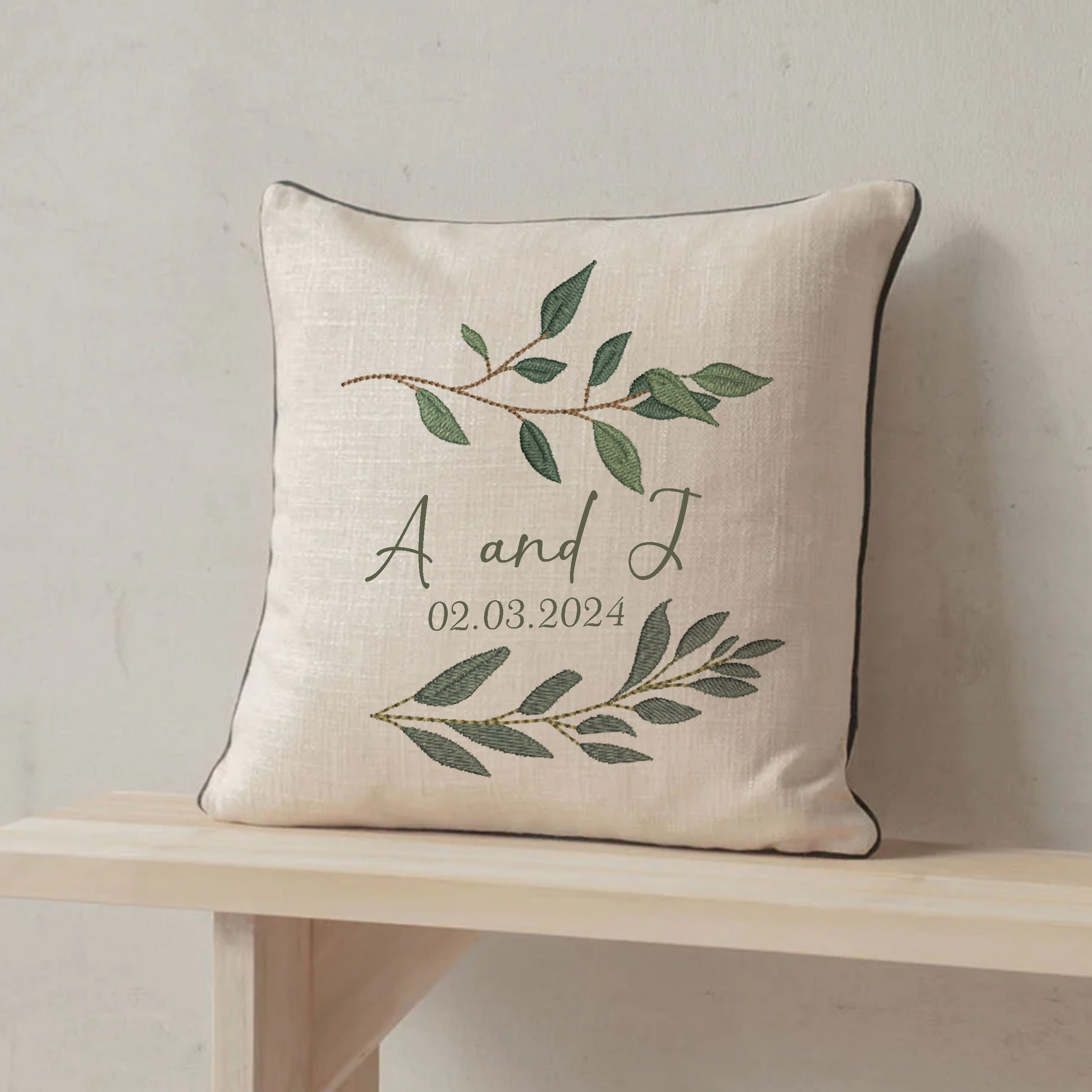Eucalyptus Laurel Branch Machine Embroidery Design embroidered on a pillow