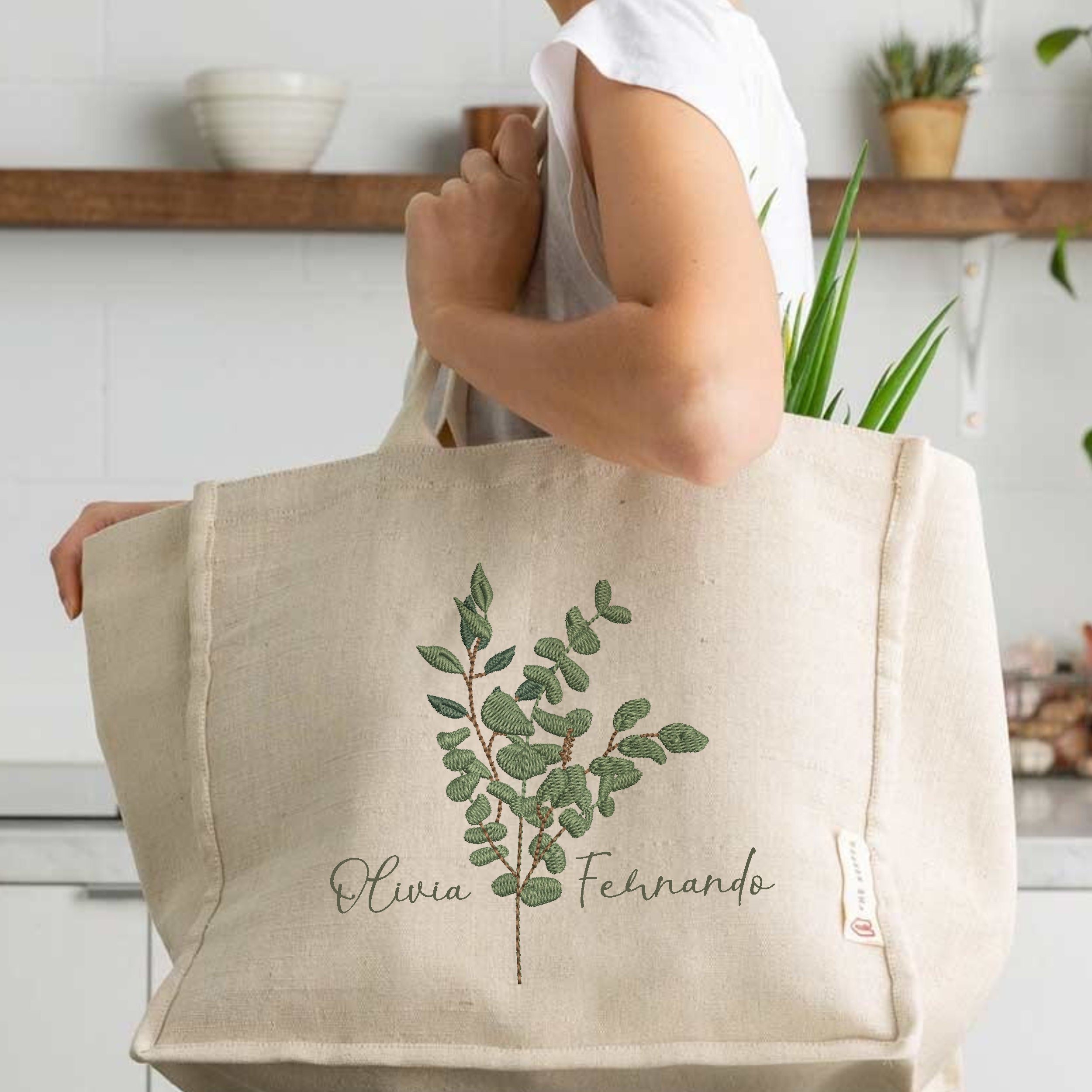Eucalyptus Laurel Branch Machine Embroidery Design embroidered on a handbag