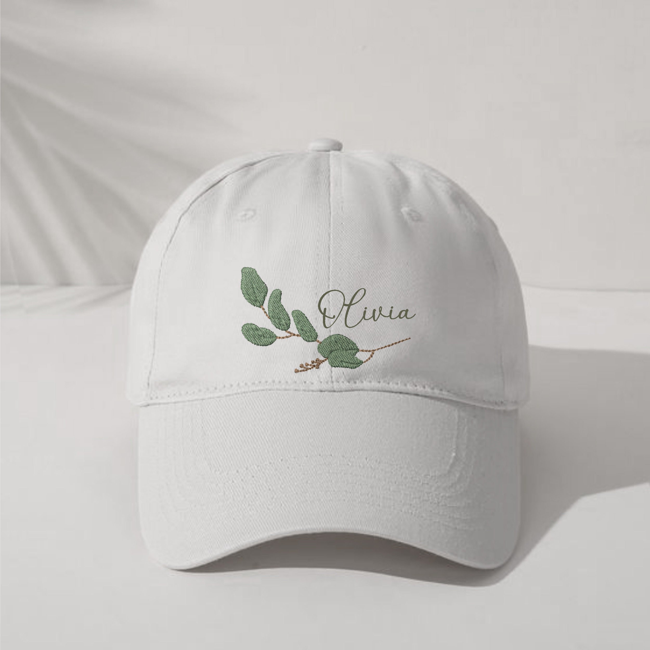Eucalyptus Laurel Branch Machine Embroidery Design embroidered on a cap