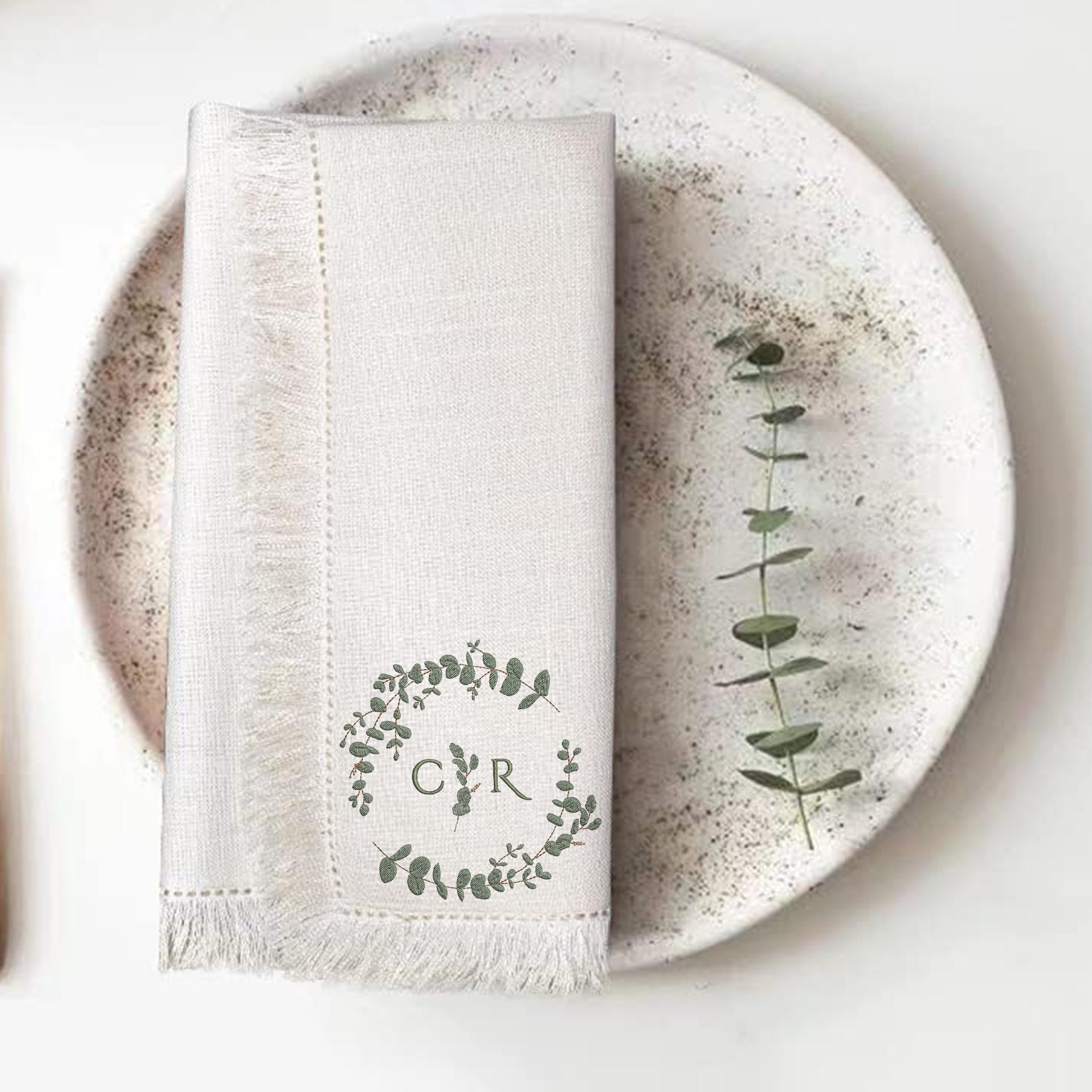 Eucalyptus Wreath Machine Embroidery Design Monogram Wedding Pattern File embroidered on a napkin