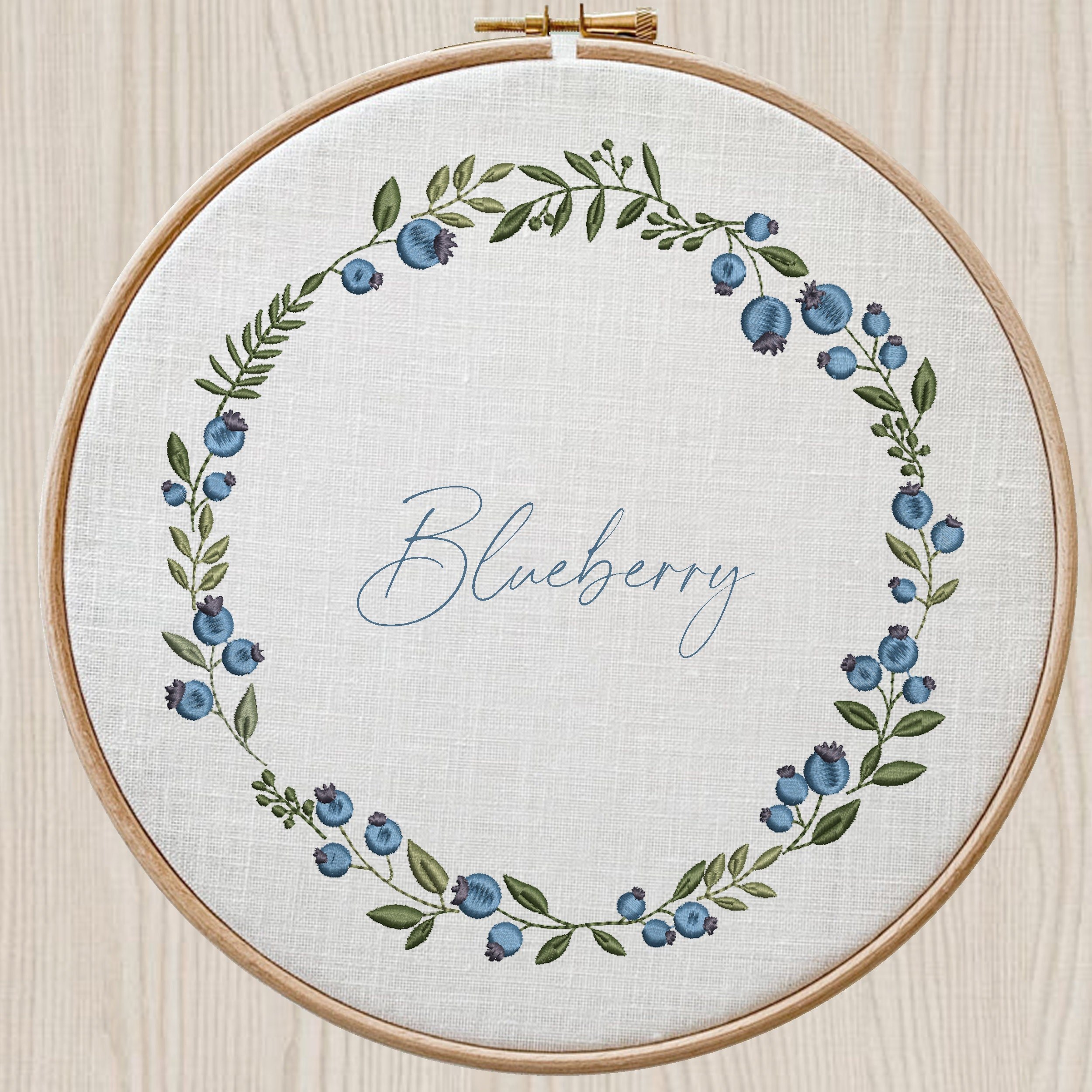 Blueberry Wreath and Border Machine Embroidery Design File embroidered on a hoop