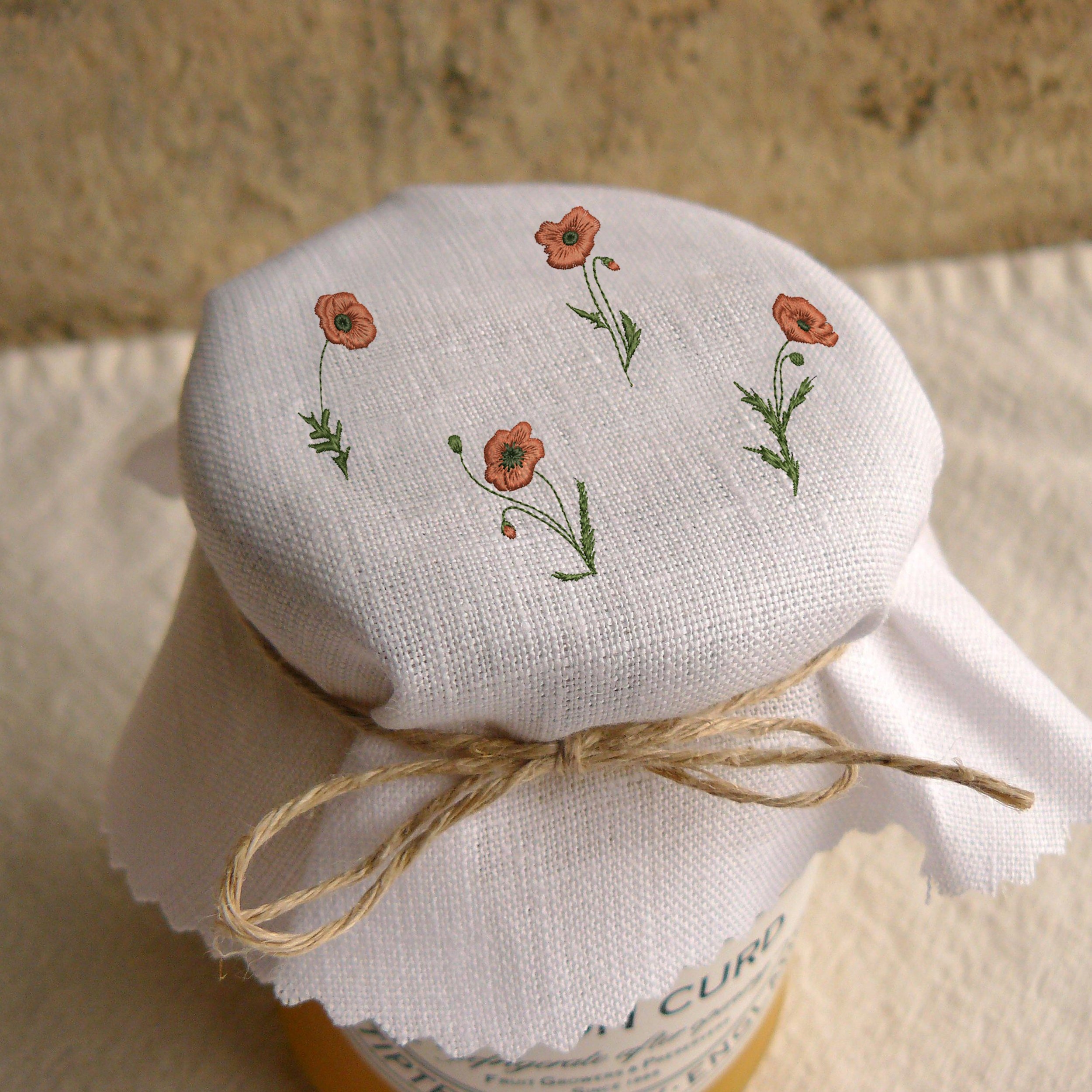 10 Poppy Flowers Machine Embroidery Design embroidered on a jam jar cover