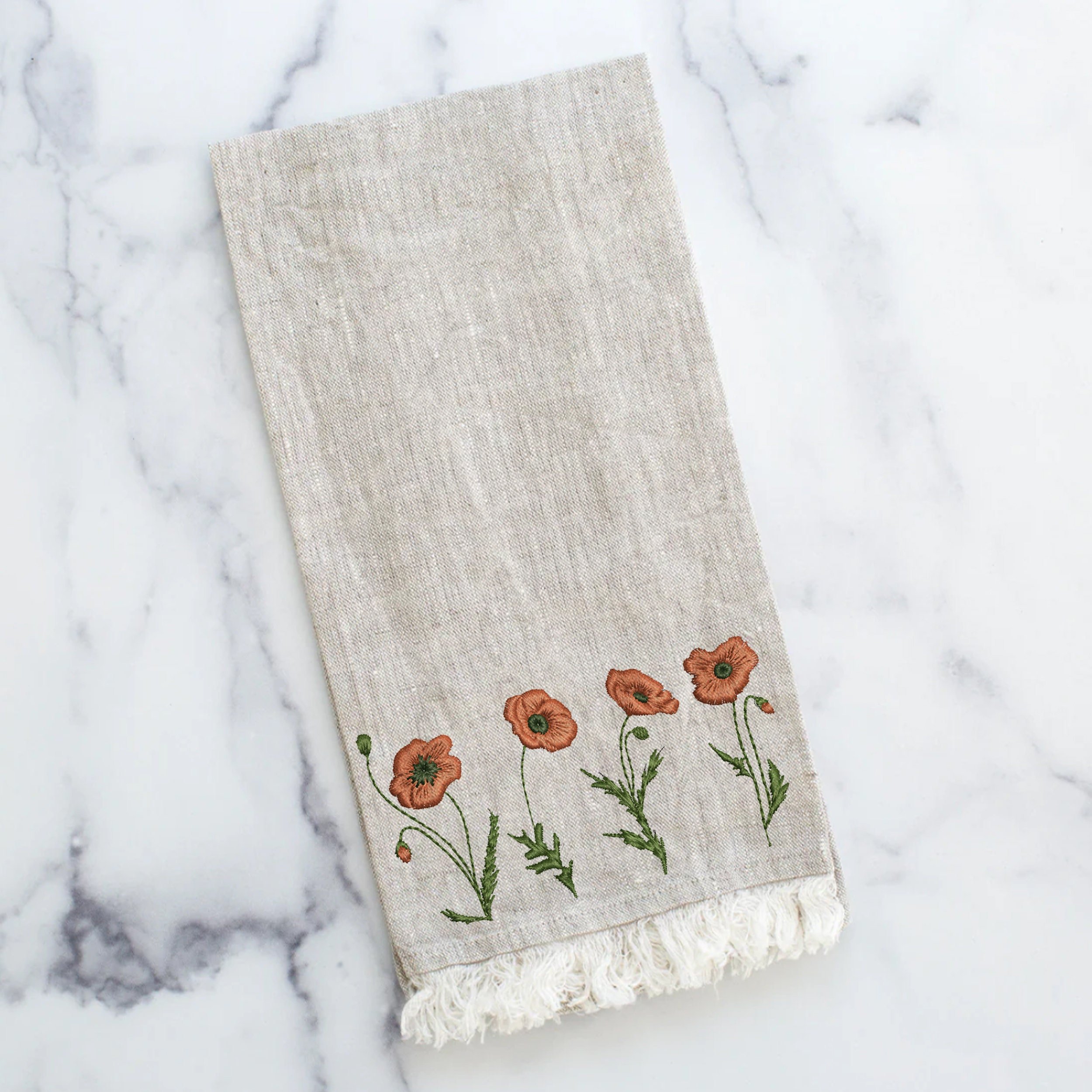 10 Poppy Flowers Machine Embroidery Design embroidered on a kitchen towel