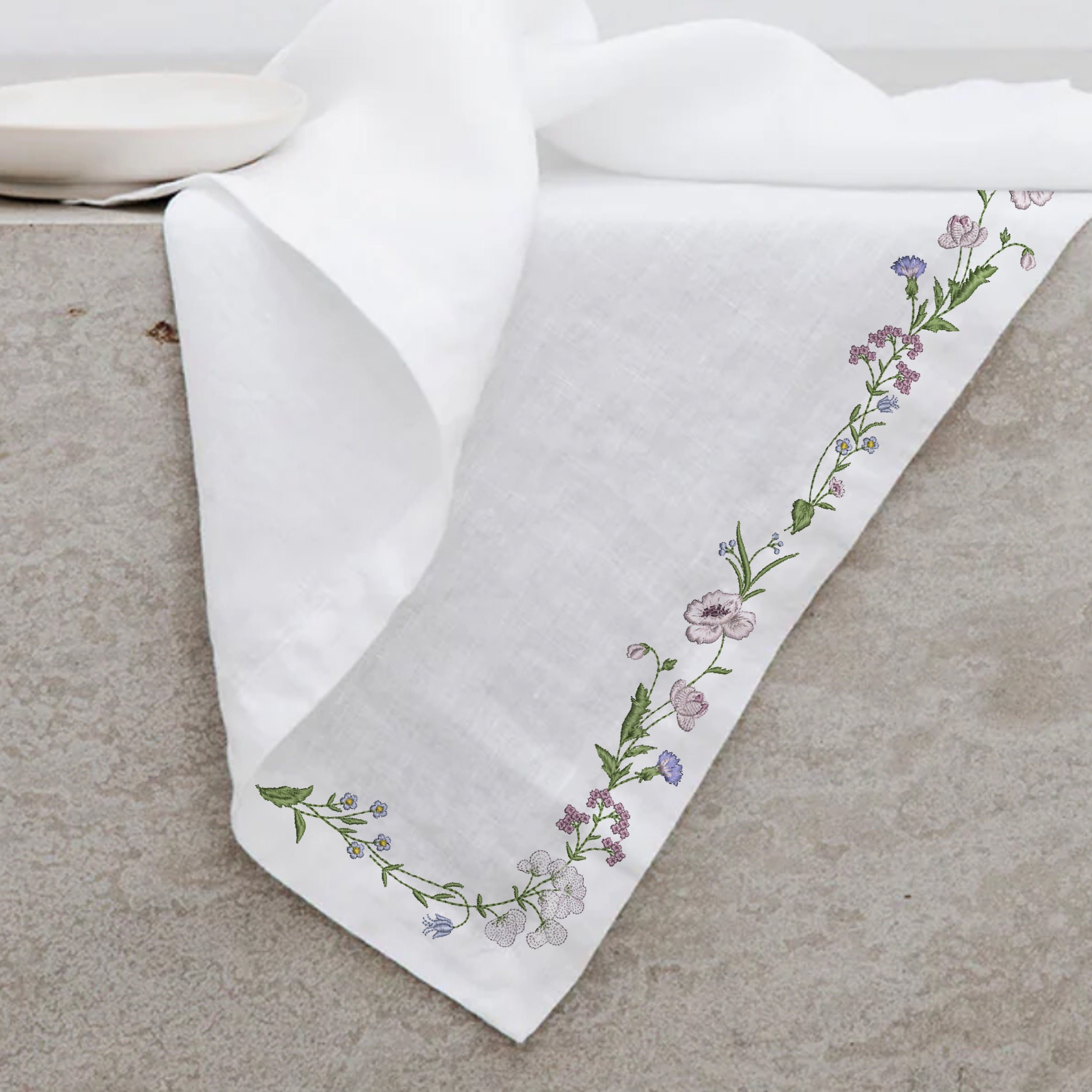 Fantastic Garden Wreath Border Corner Machine Embroidery Design embroidered on a table cloth