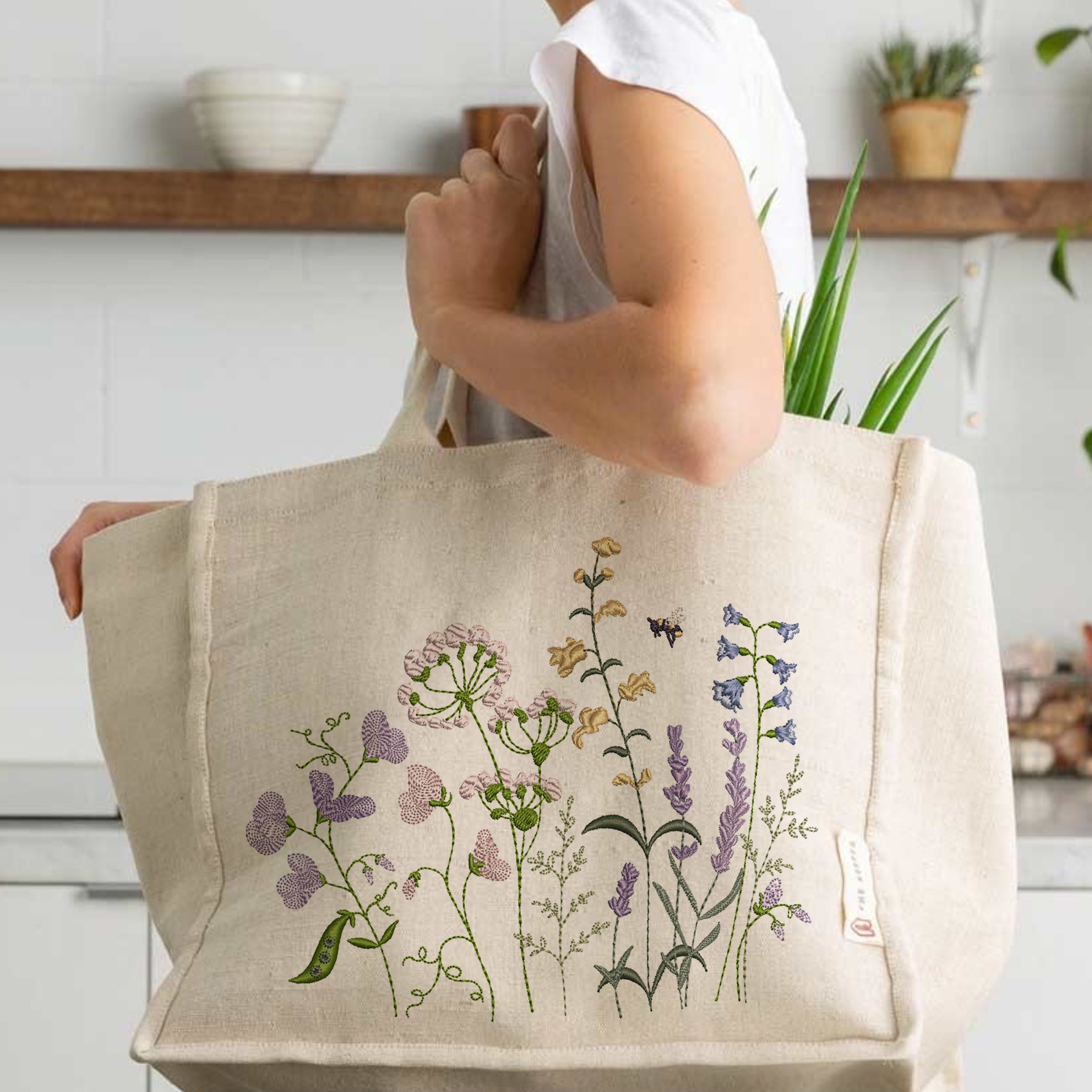 Sweet Pea Flower Meadow Machine Embroidery Design embroidered on a handbag