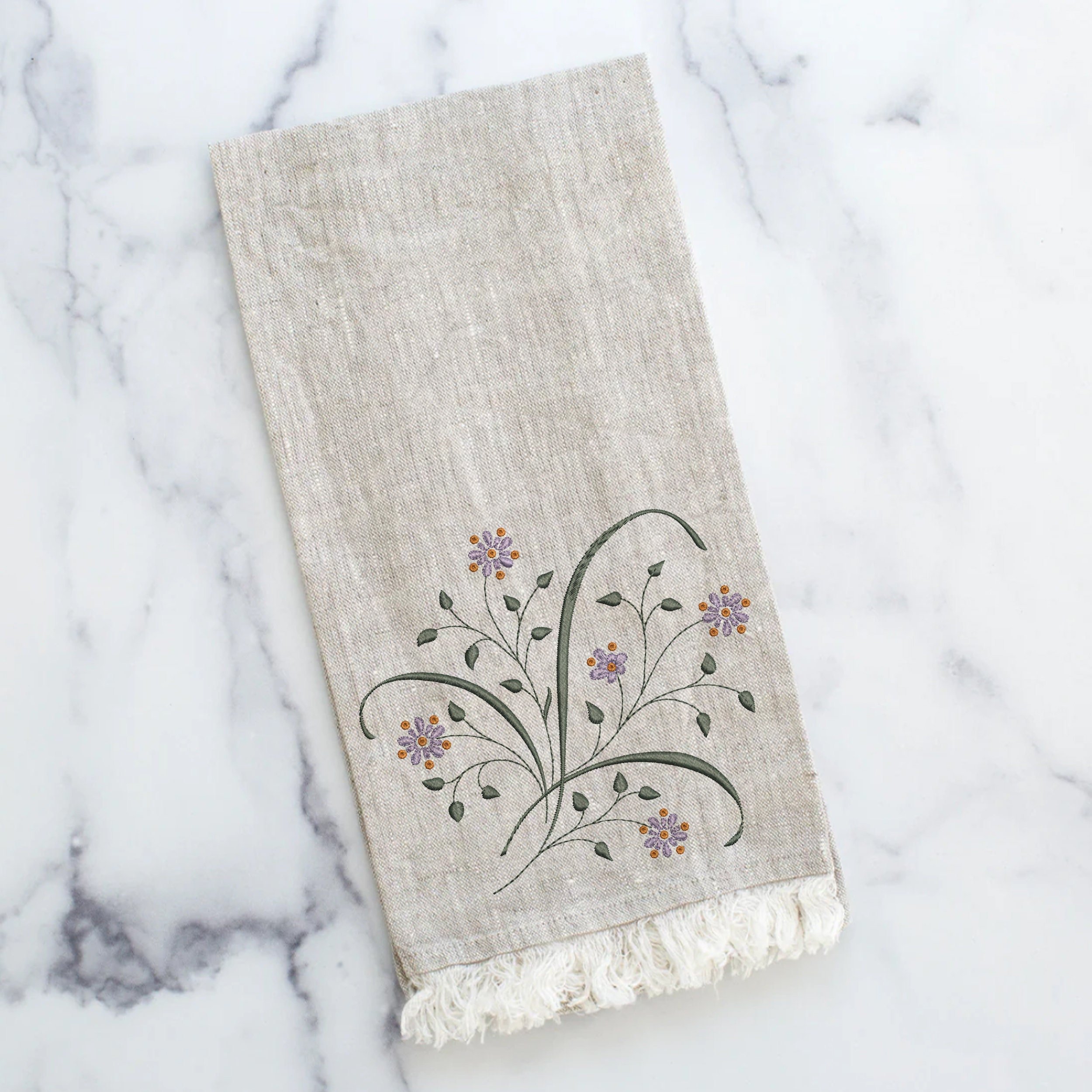 Fairytale Garden Flower Motif Machine Embroidery Design Digital File embroidered on a tea towel