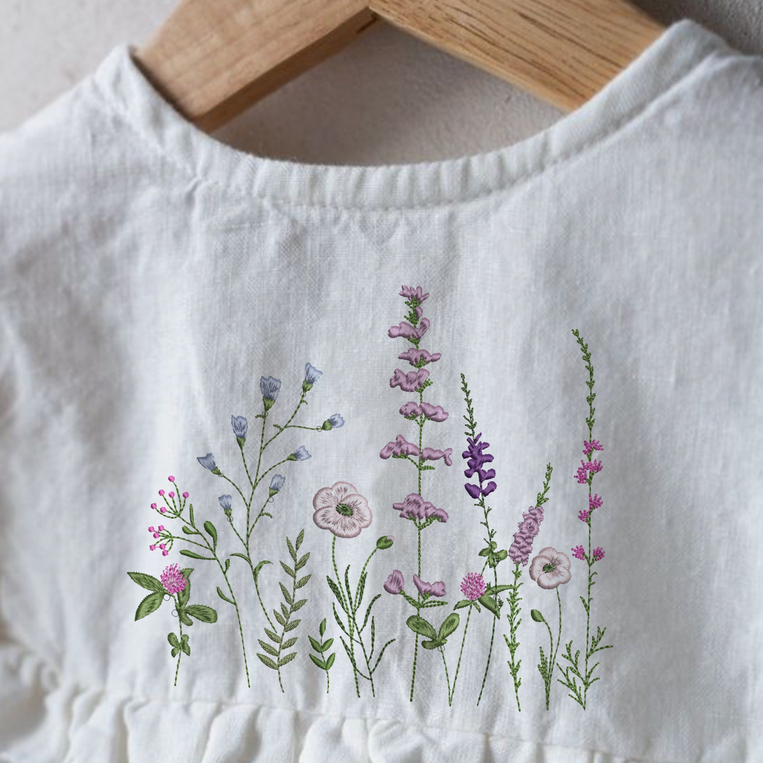 Sweet Meadow Machine Embroidery Design File embroidered on a linen fabric