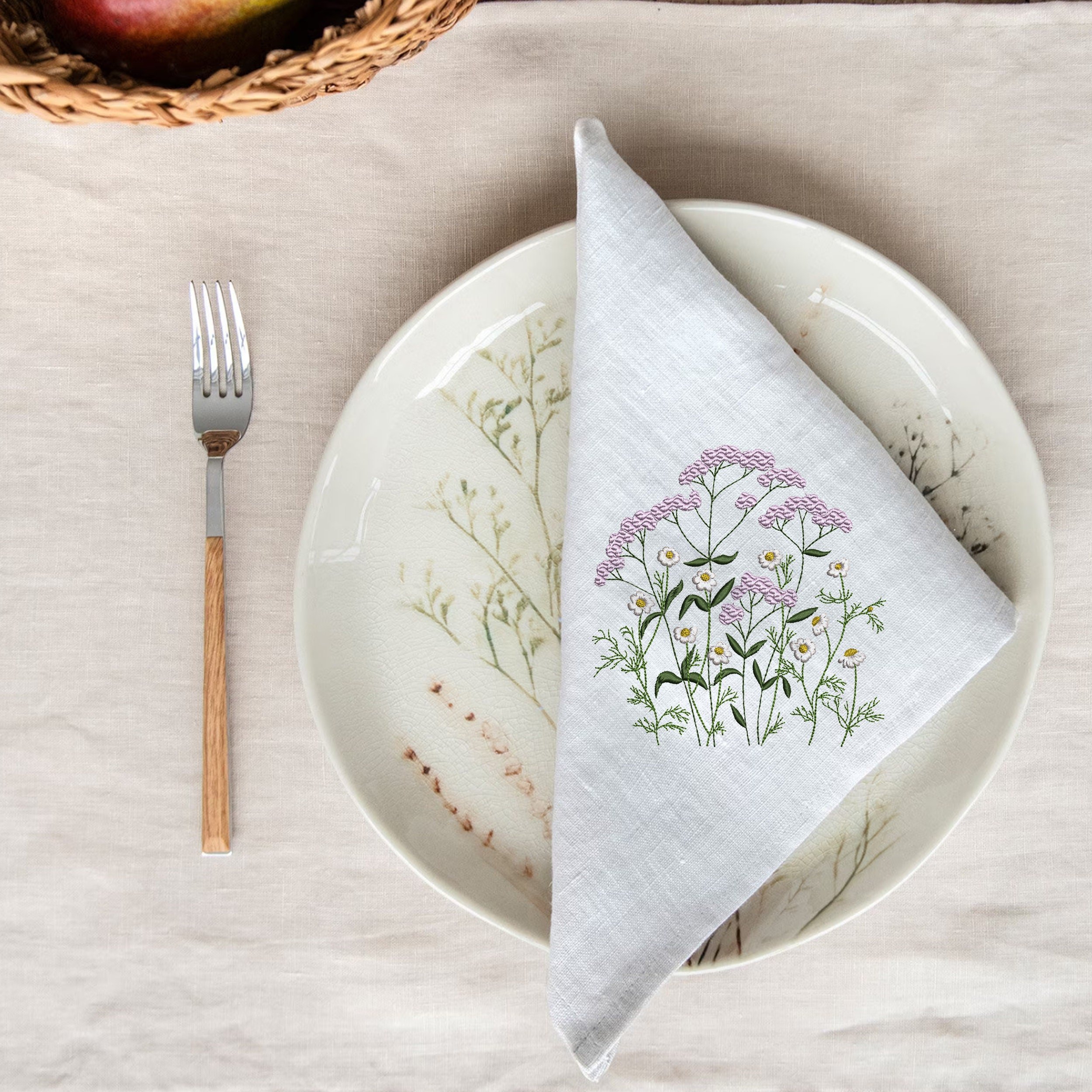 Queen Anne's Lace Flower and Chamomile Machine Embroidery Design Pattern embroidered on a napkin