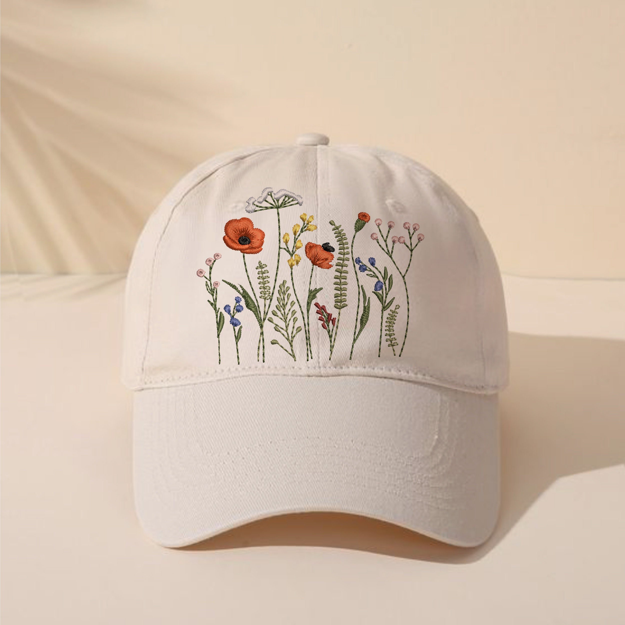 Cowgirl Wildflower Meadow Machine Embroidery Design embroidered on a hat