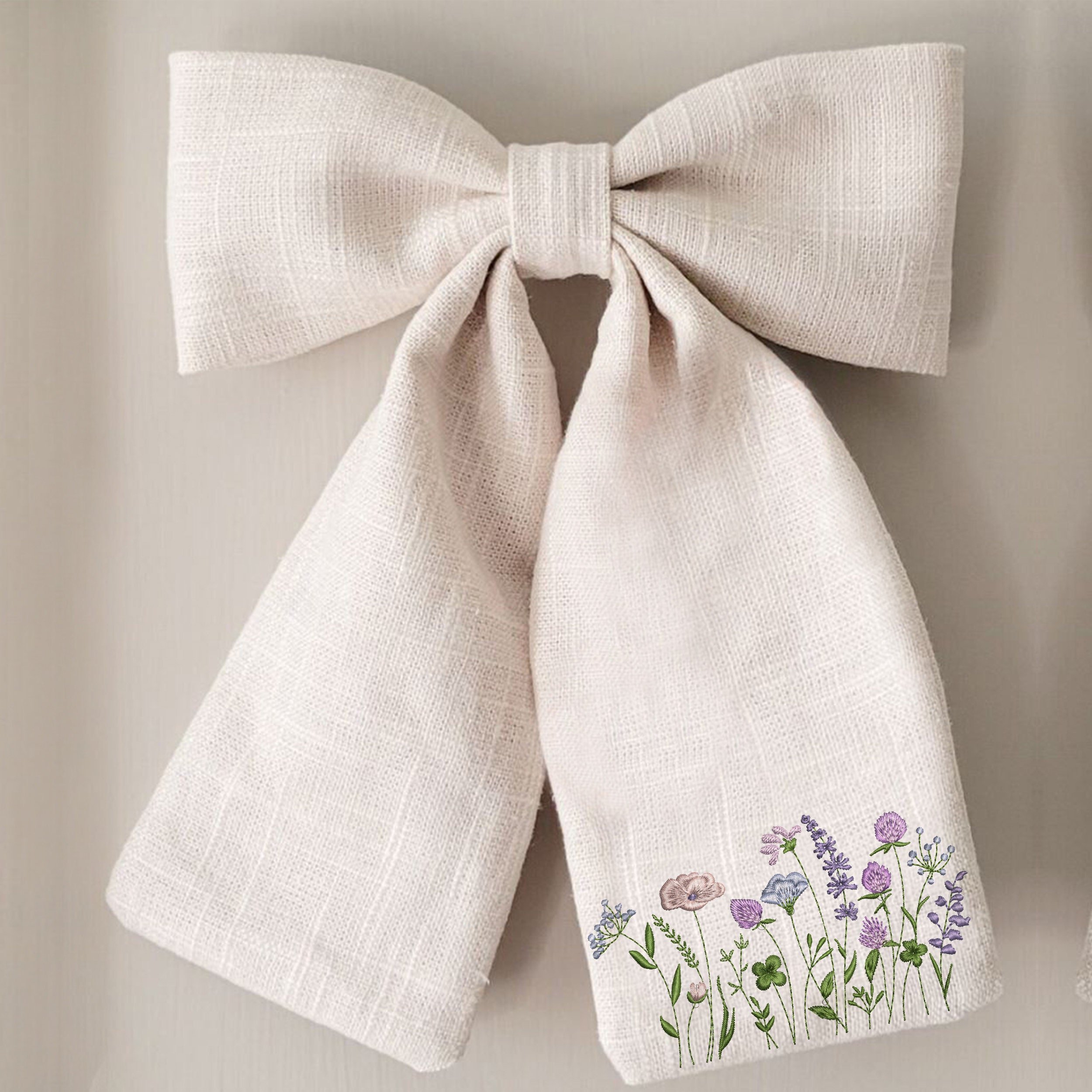 Clover Flower Garden Machine Embroidery Design embroidered on a bow