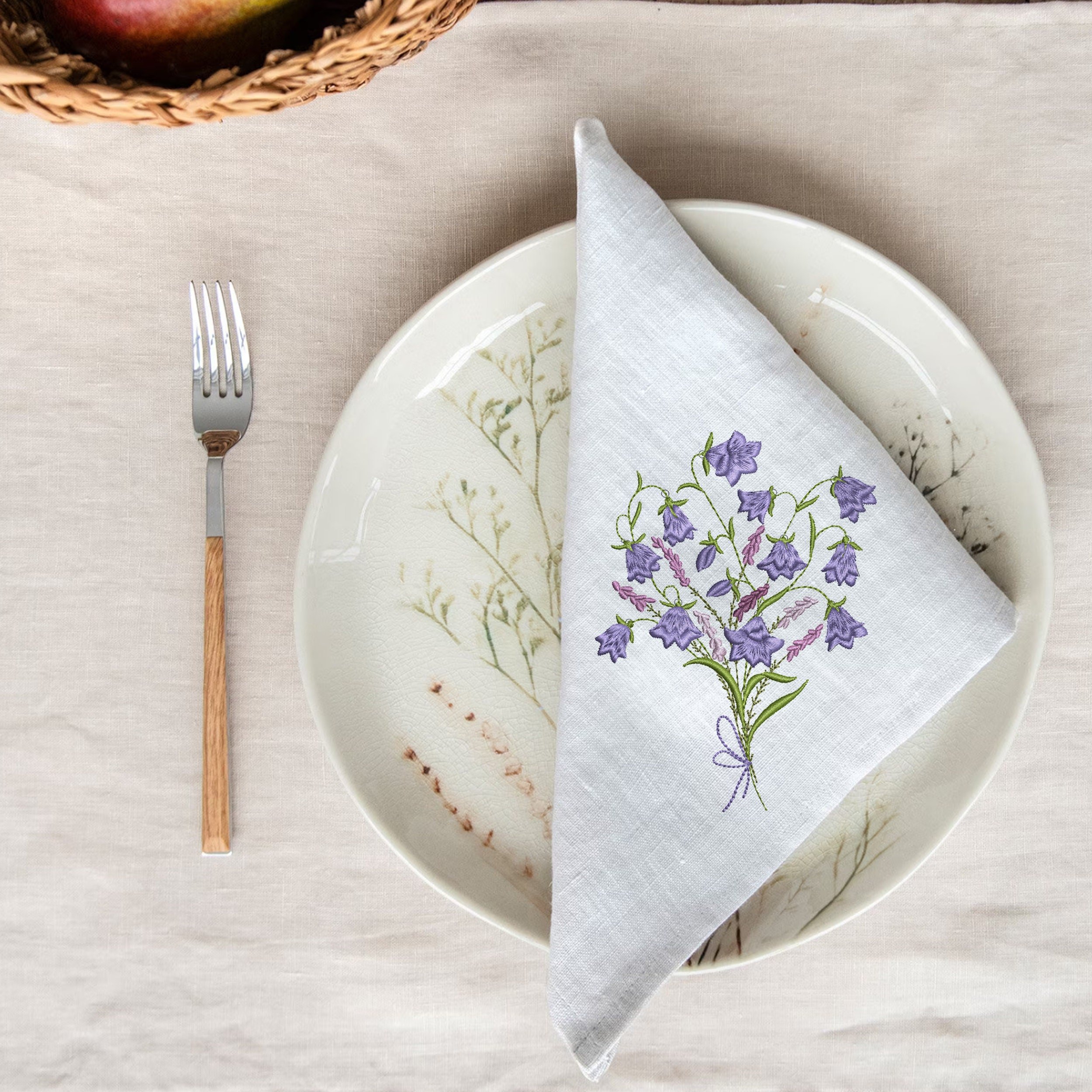 Harebells and Heather Flower Bouquet Machine Embroidery Design embroidered on a cocktail napkin