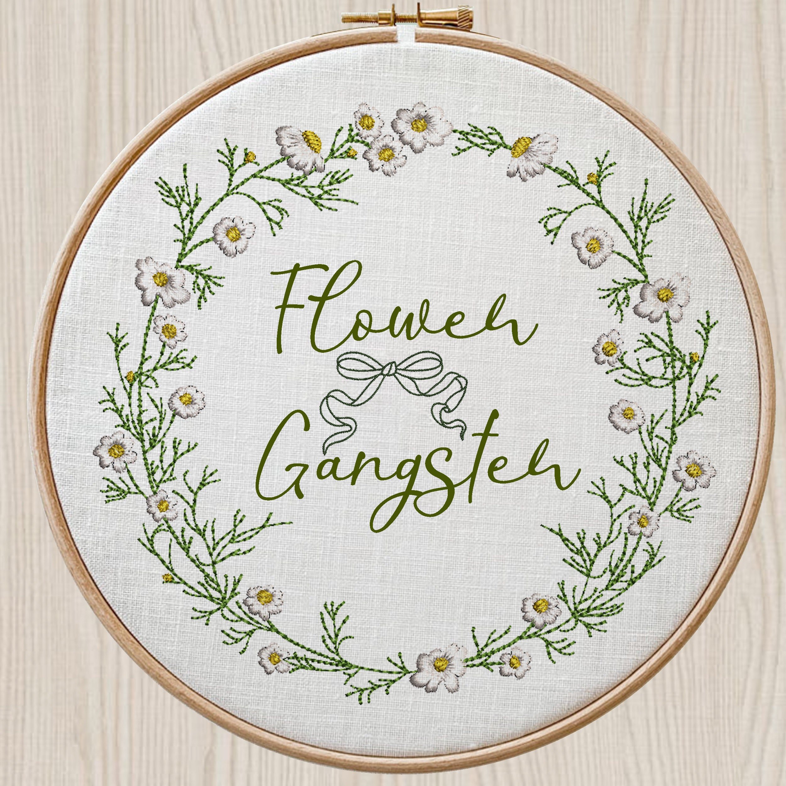 Chamomile Wreath and Border Machine Embroidery Design Bundle embroidered on a hoop