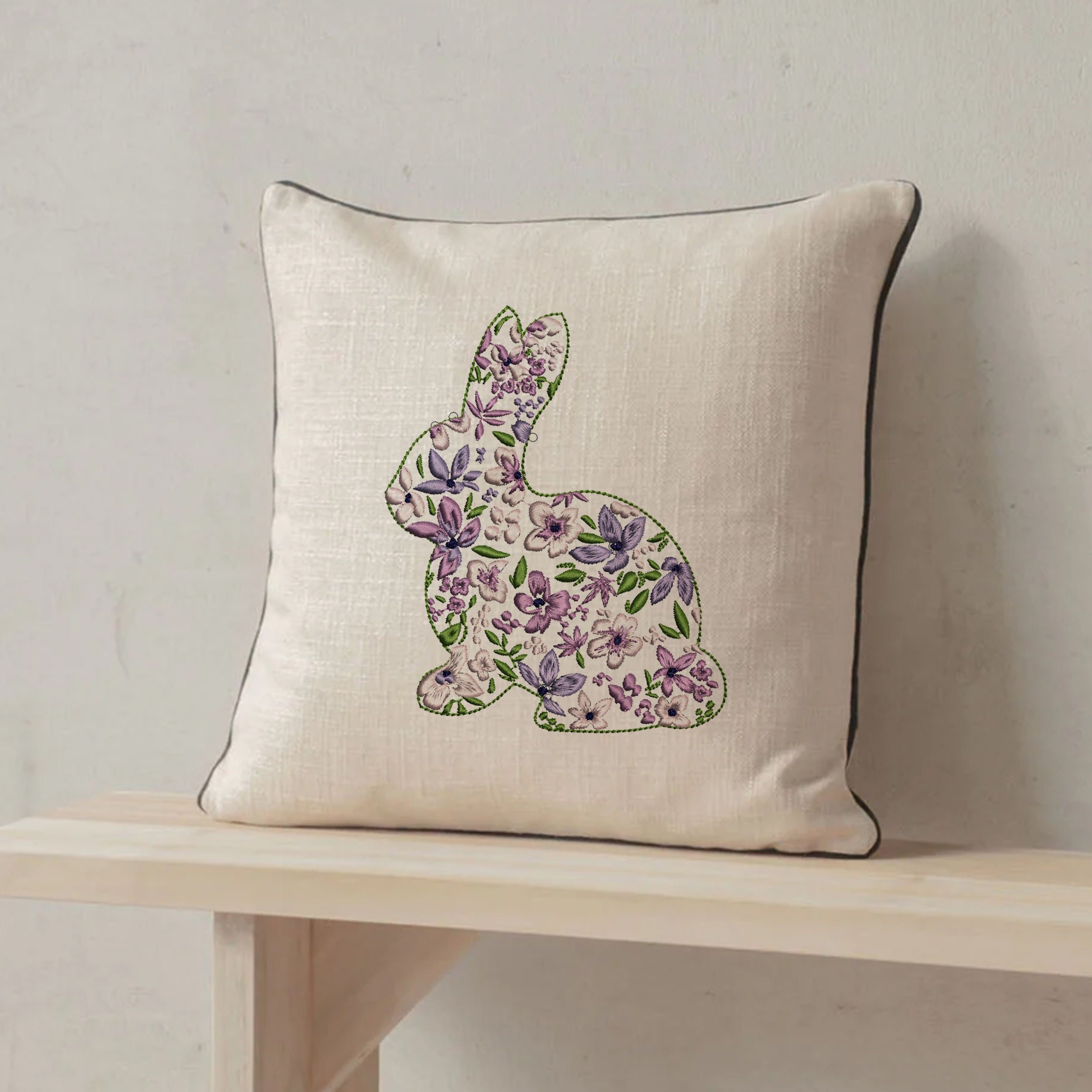 Floral Easter Bunny Machine Embroidery Design Zip File embroidered on a pillow