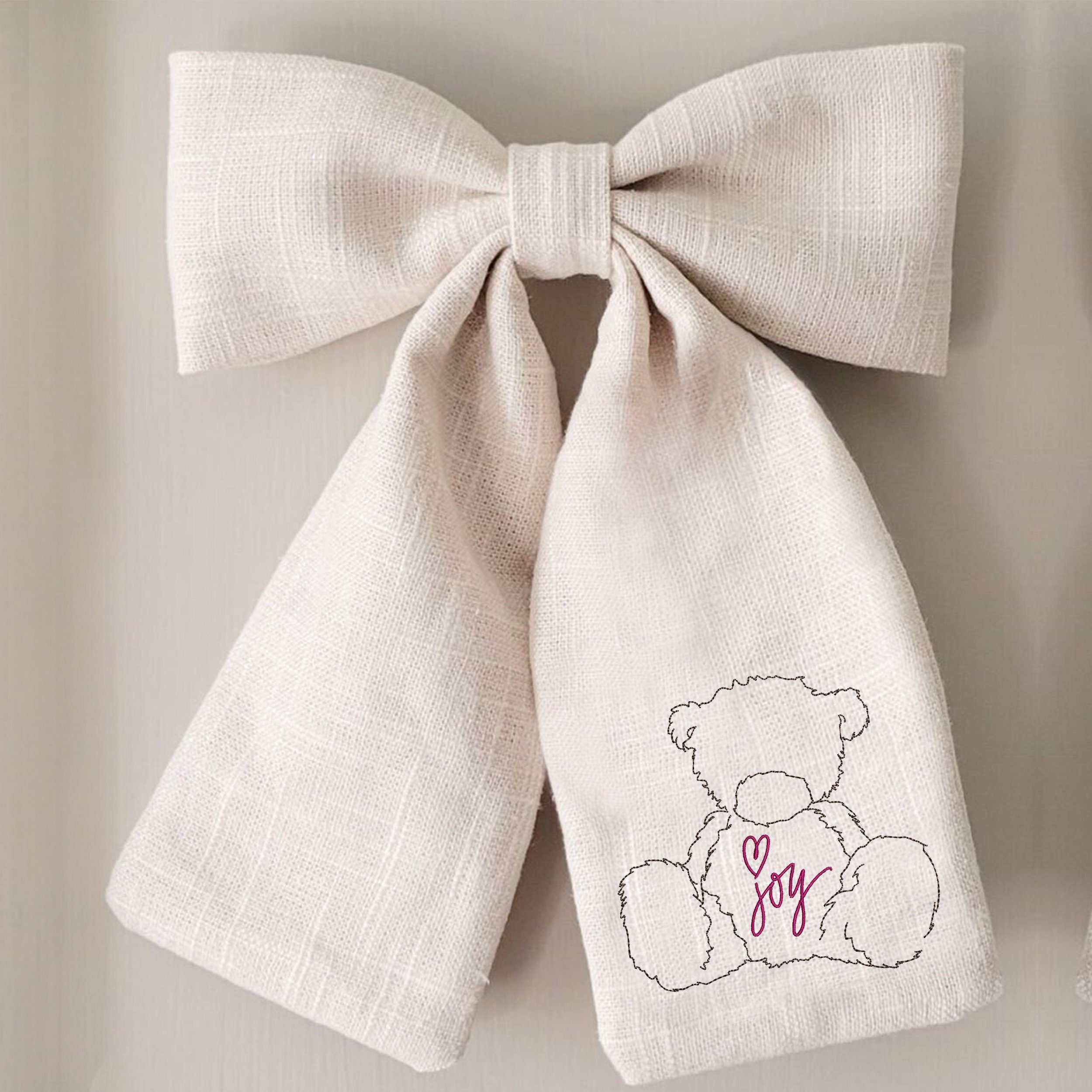 Birthday Teddy Bear Machine Embroidery Design File embroidered on a bow