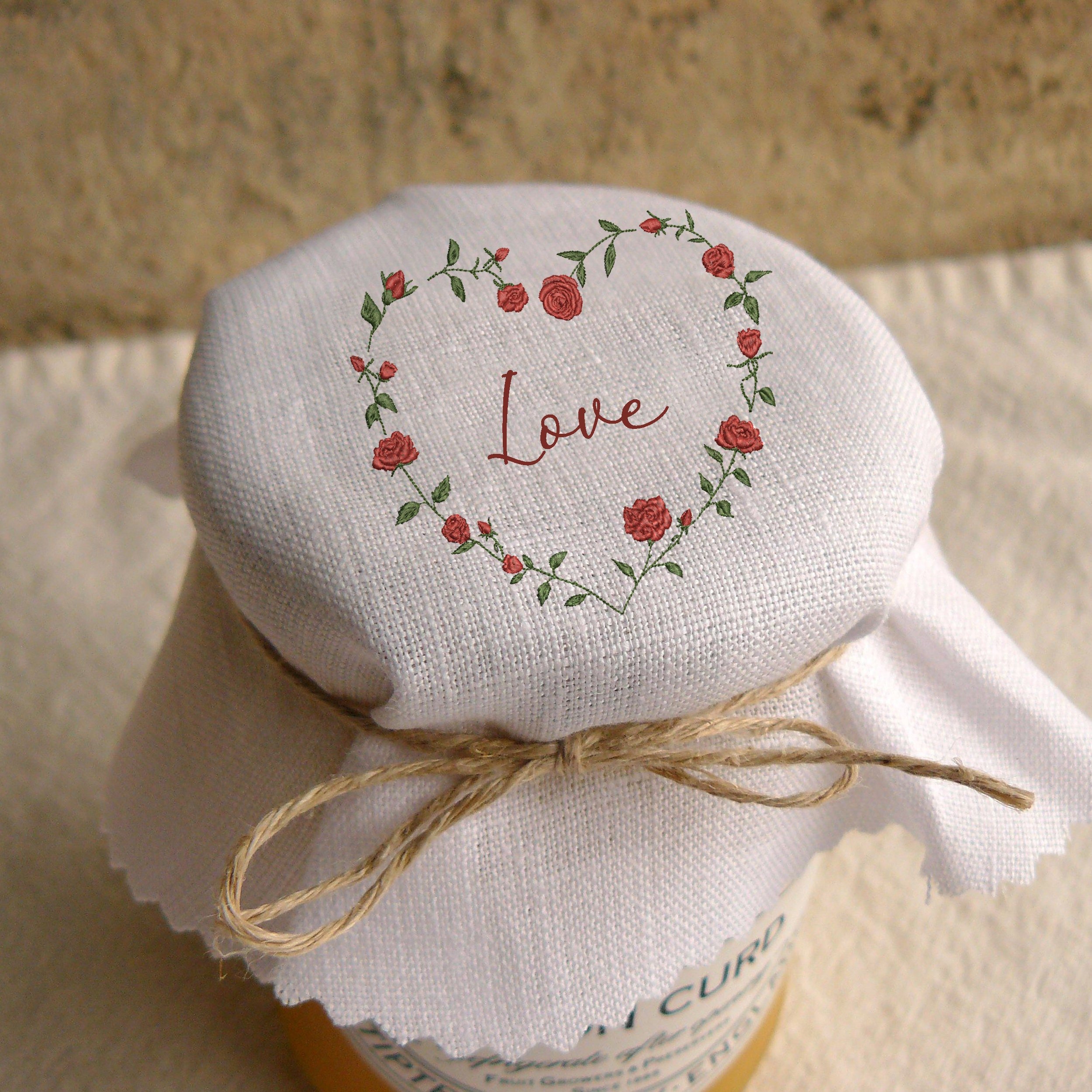 St Valentine's Day Rose Heart Monogram Wreath Frame Machine Embroidery Design Pattern embroidered on a jam jar cover