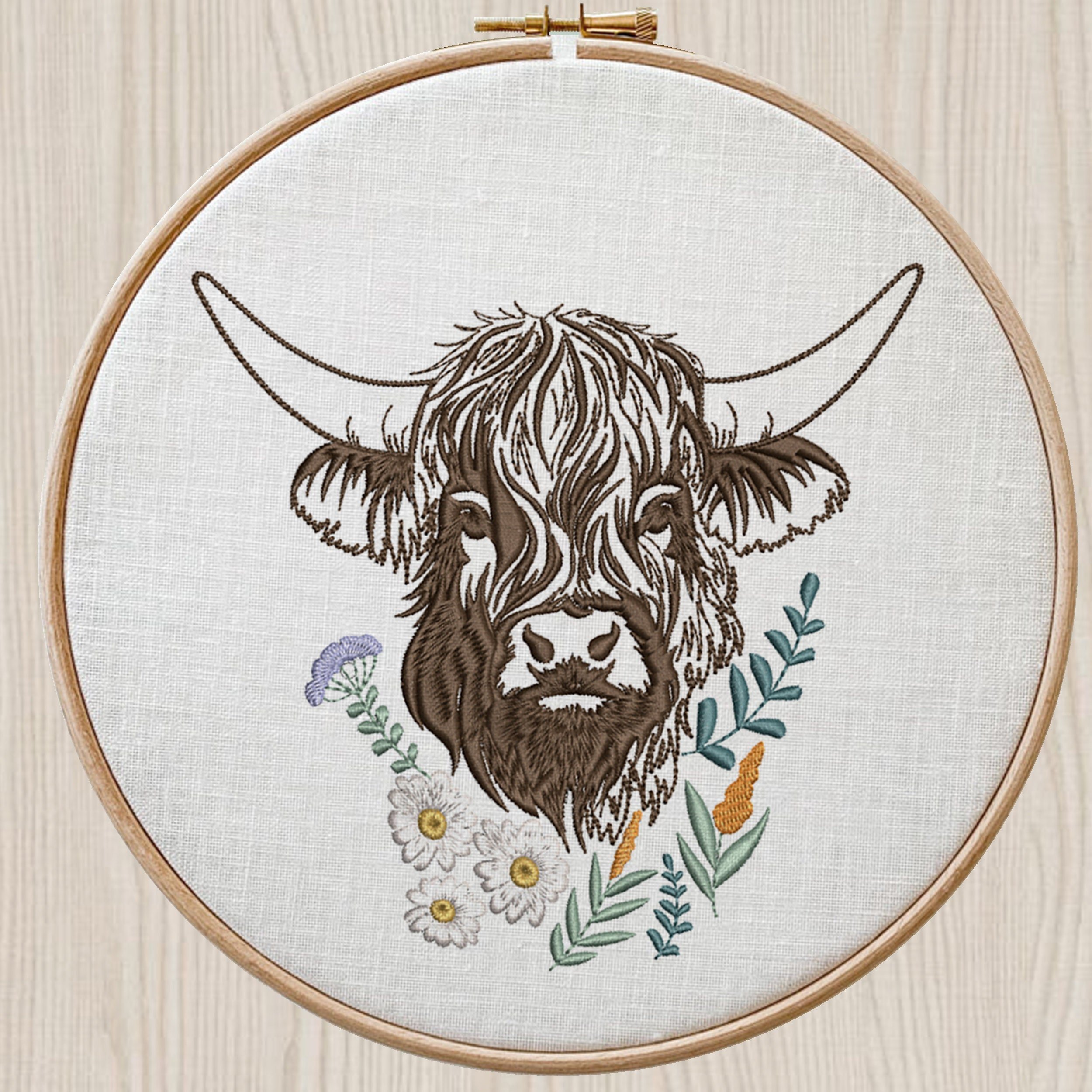 Highland Scottish Cow and Chamomiles Machine Embroidery Design File embroidered on a hoop