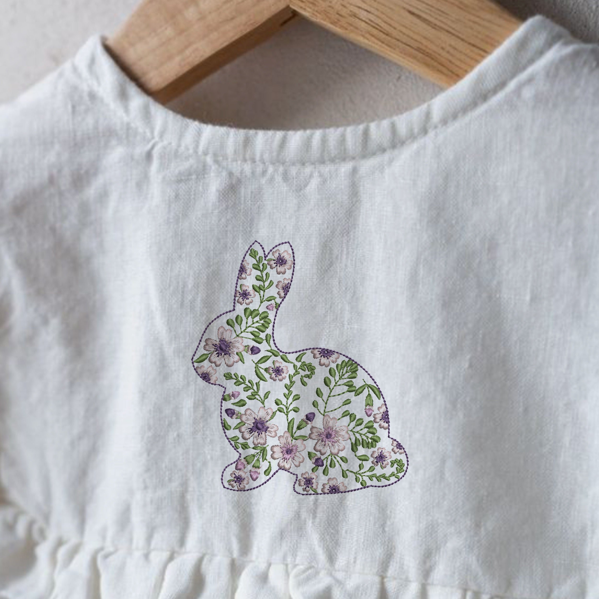 Flower Easter Bunny Machine Embroidery Design File embroidered on a linen blouse