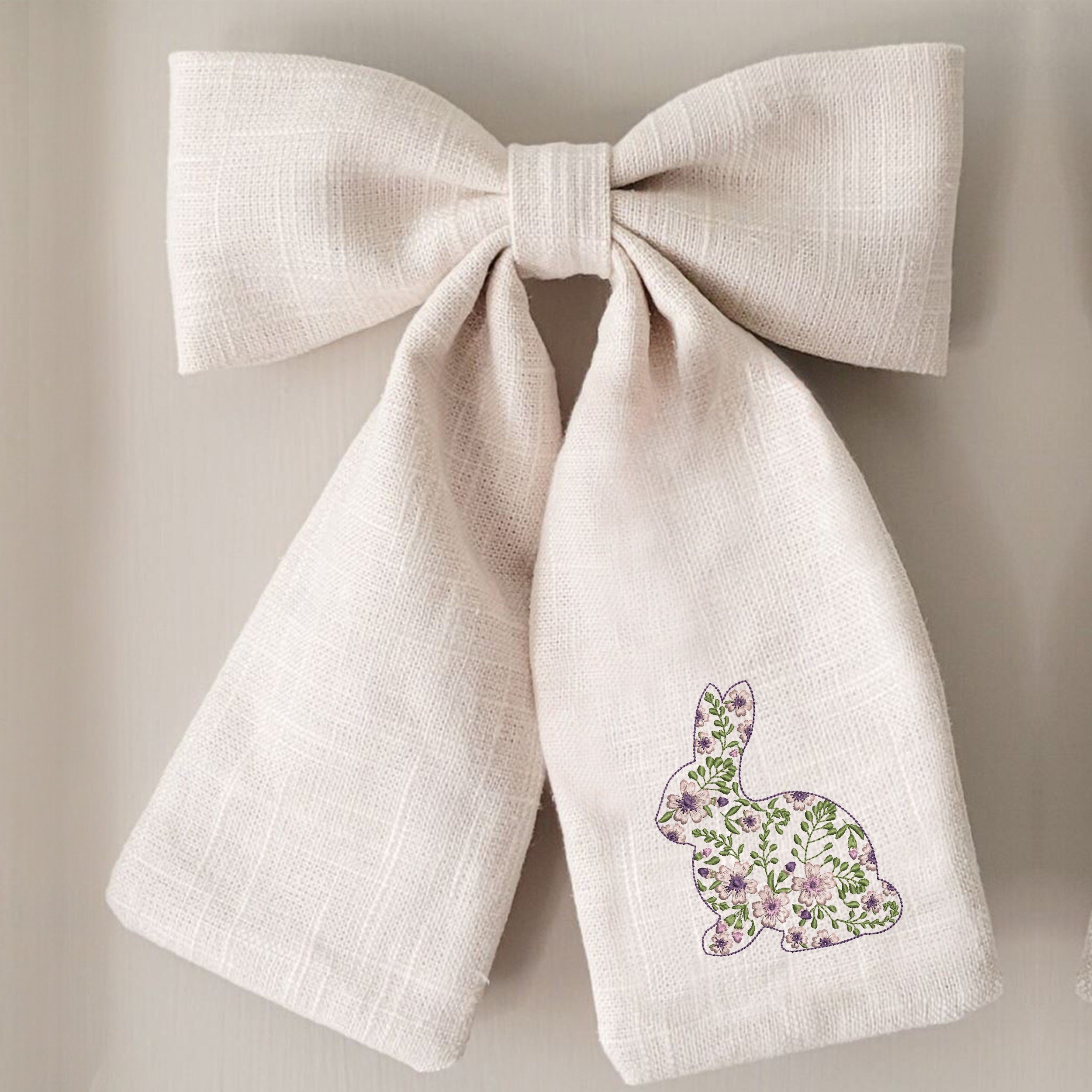 Flower Easter Bunny Machine Embroidery Design File embroidered on a bow