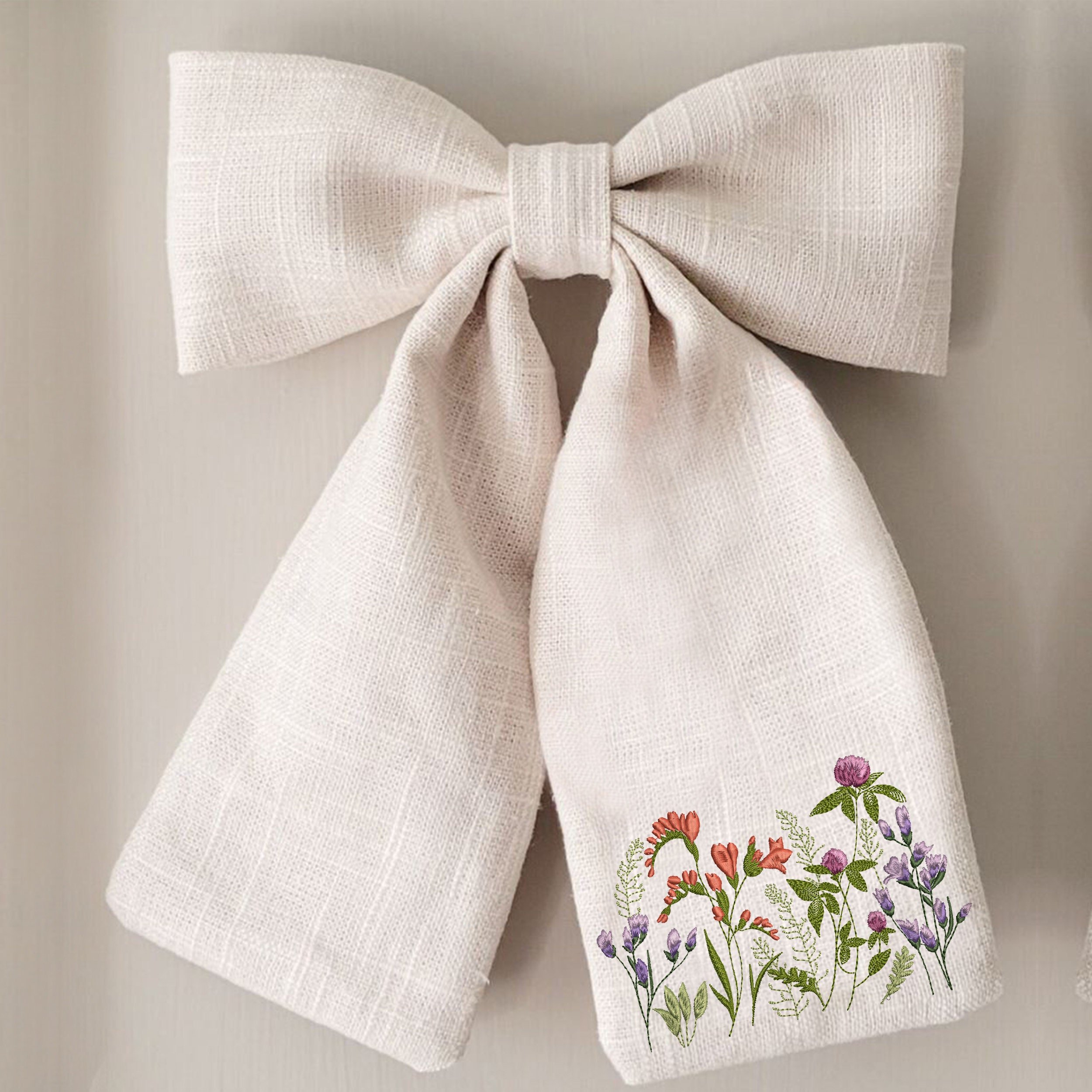 Clover and Freesia Garden Machine Embroidery Design zip file embroidered on a bow