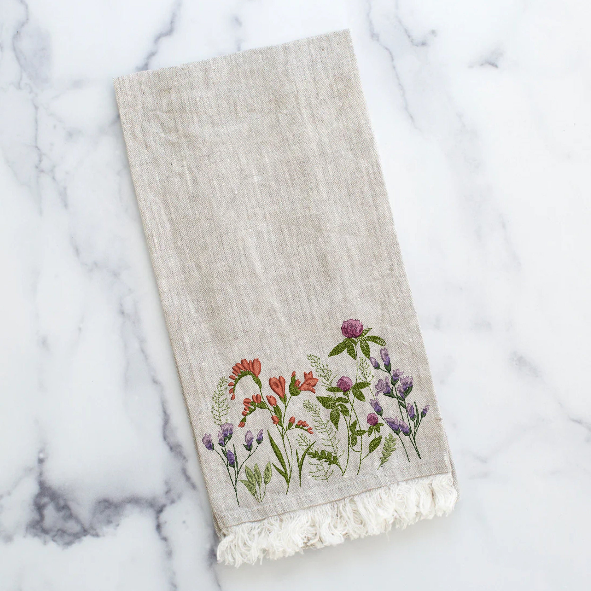 Clover and Freesia Garden Machine Embroidery Design zip file embroidered on a tea towel
