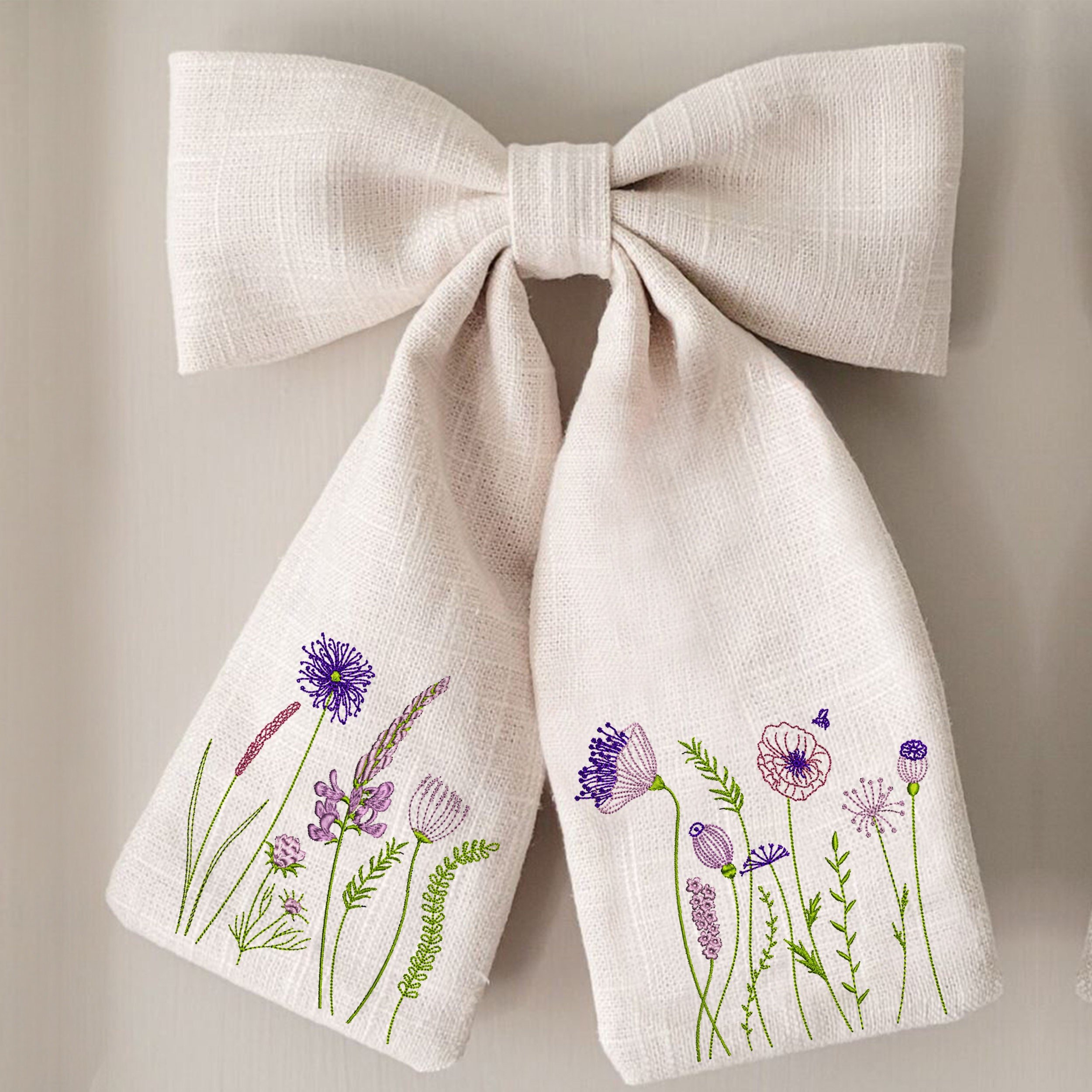 Dream Flower Meadow Machine Embroidery Design File embroidered on a bow border
