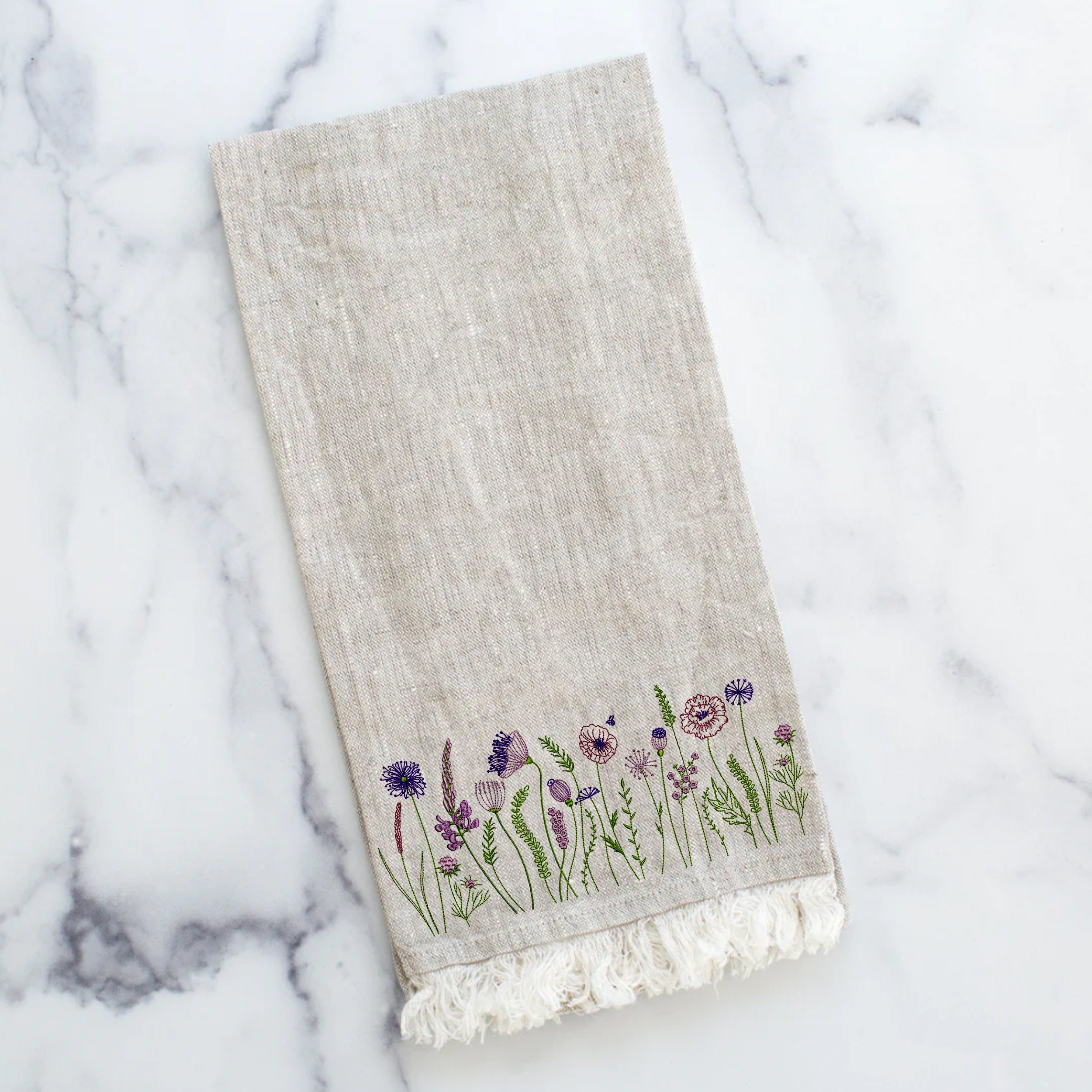 Dream Flower Meadow Machine Embroidery Design File embroidered on a tea towel