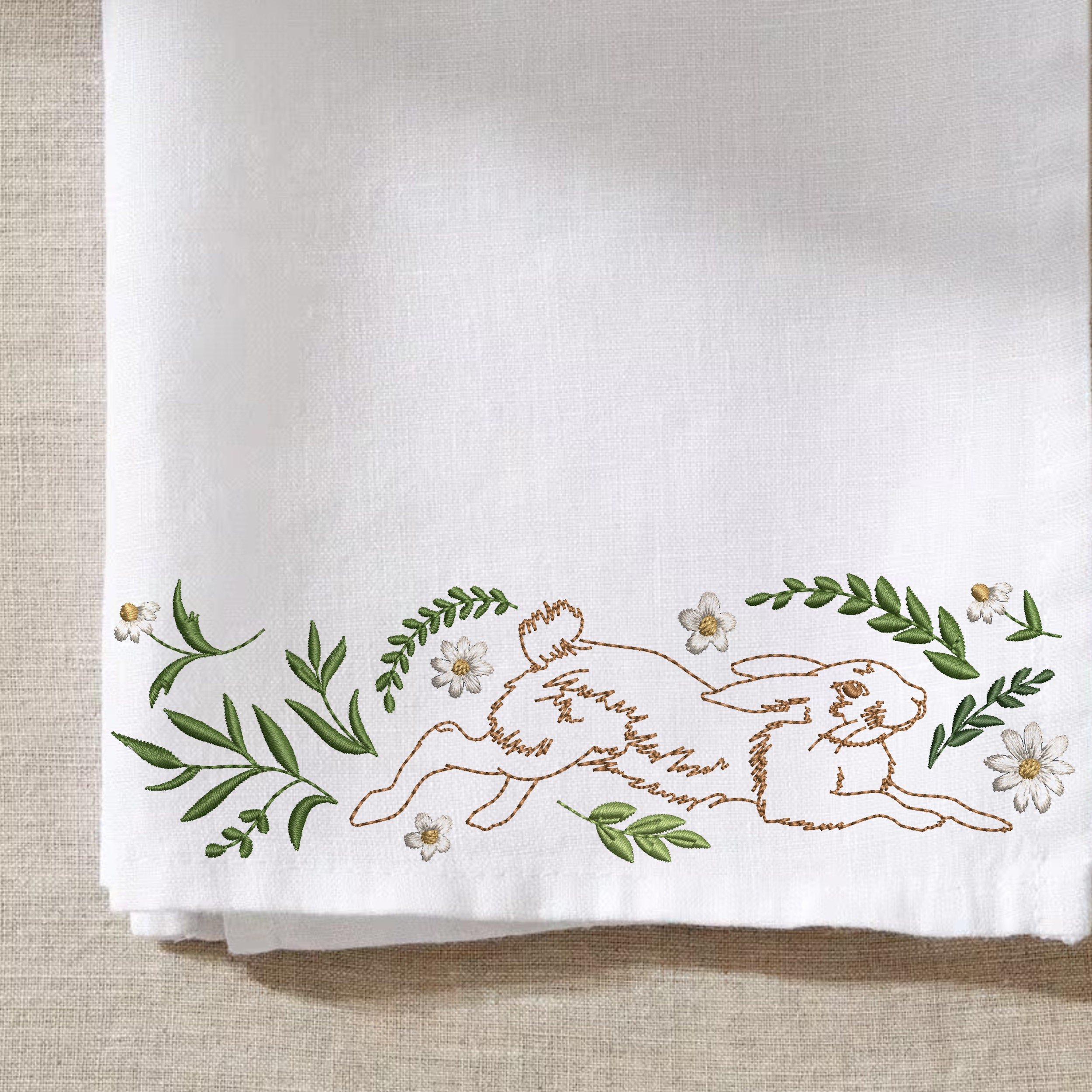 Floral Easter Bunny Border Machine Embroidery Design File embroidered on a towel