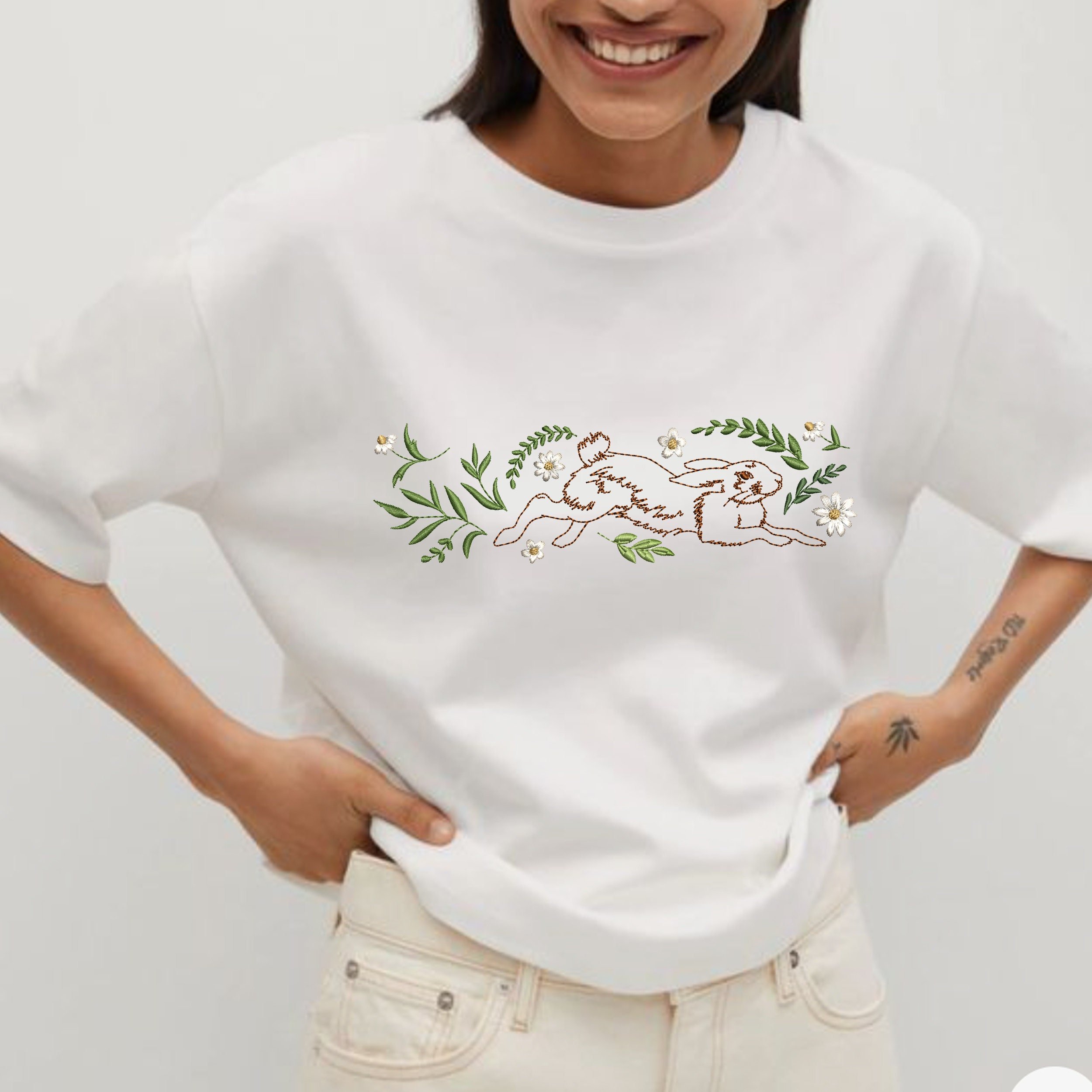 Floral Easter Bunny Border Machine Embroidery Design File embroidered on a t-shirt