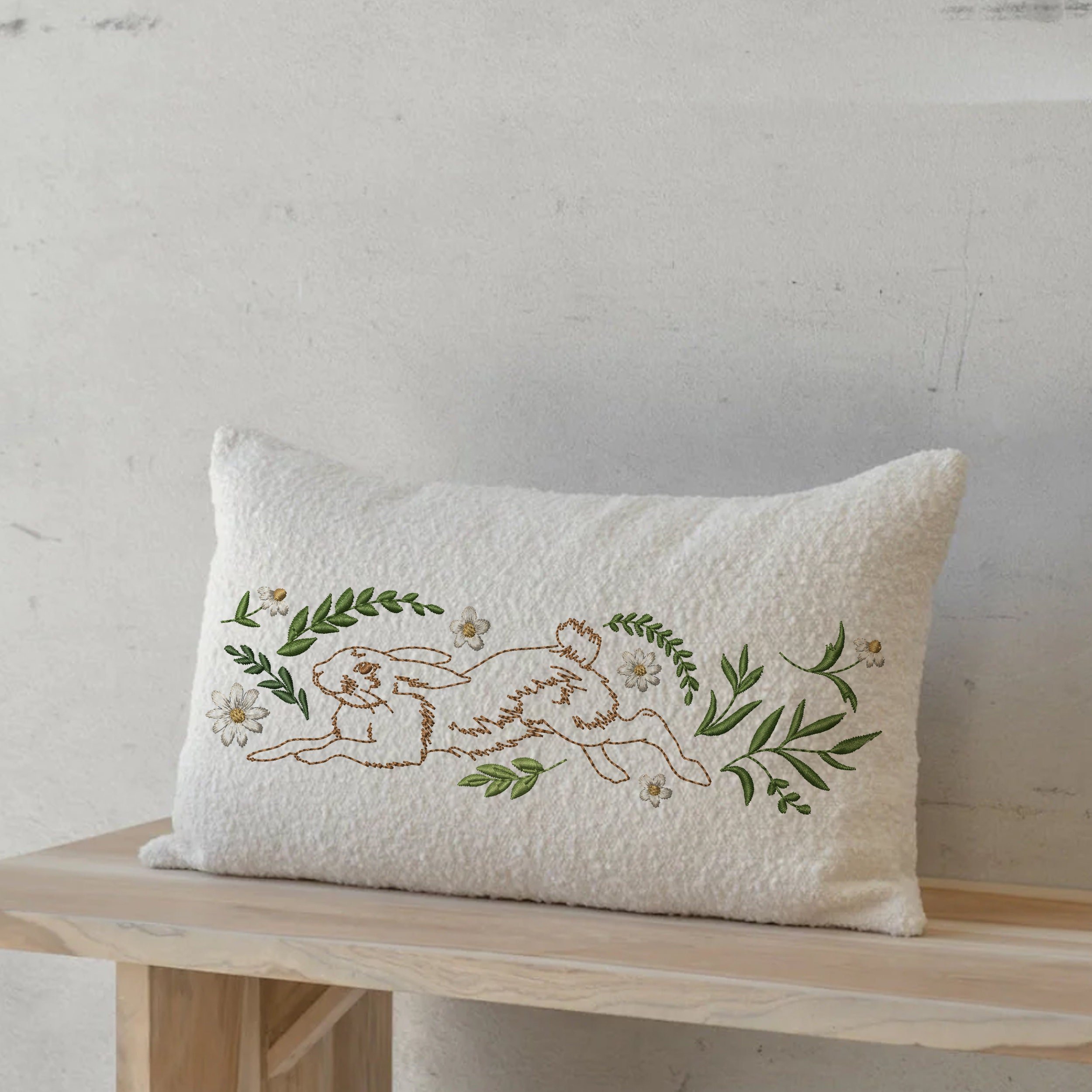 Floral Easter Bunny Border Machine Embroidery Design File embroidered on a pillow