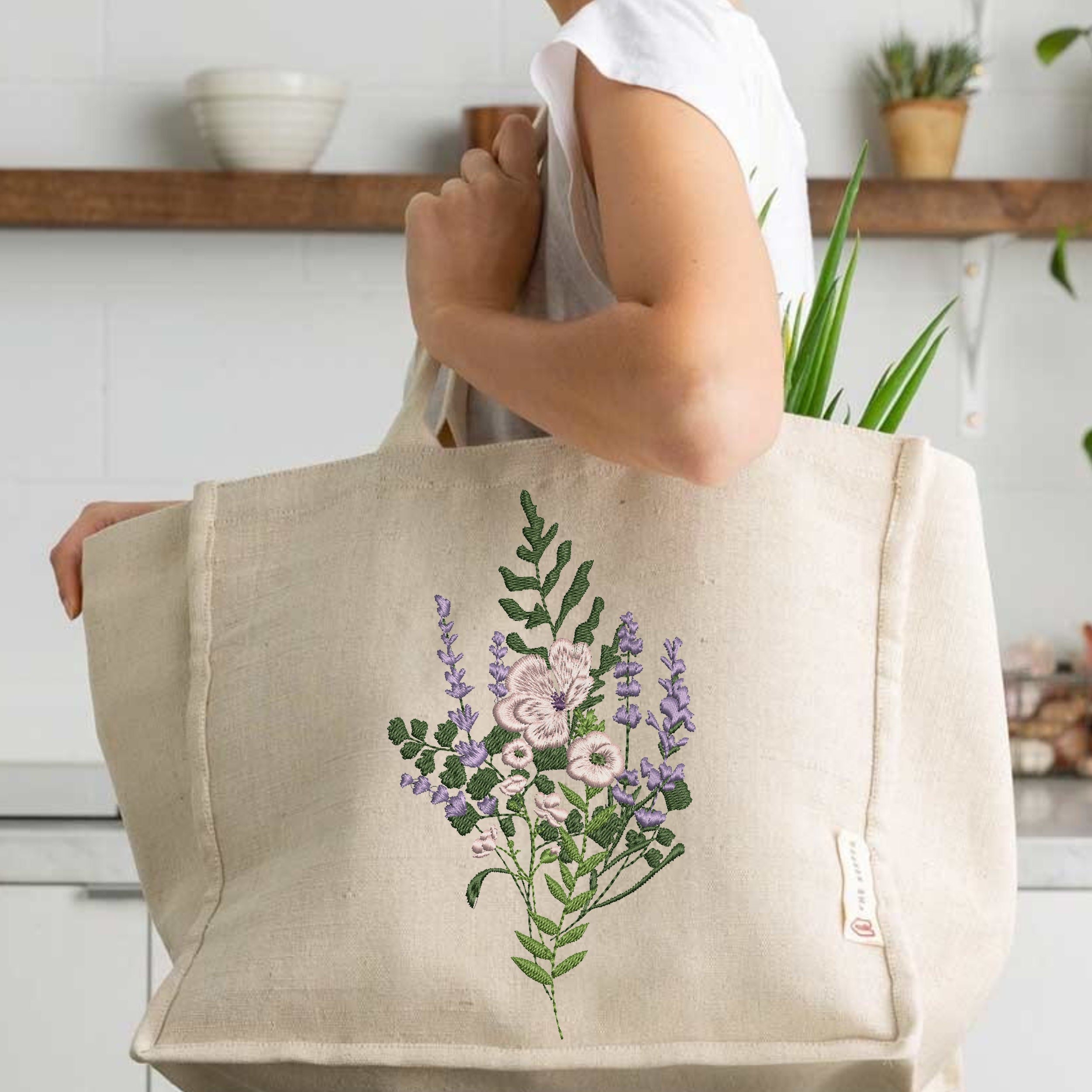 Poppy and Fern Meadow Bouquet Machine Embroidery Design embroidered on a a handbag