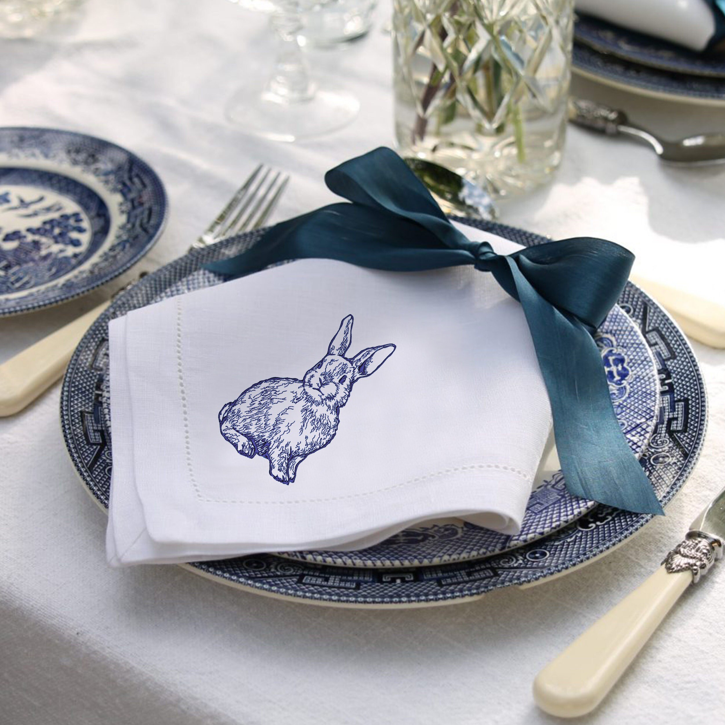 Natural Rabbit for Machine Embroidery embroidered on a napkin