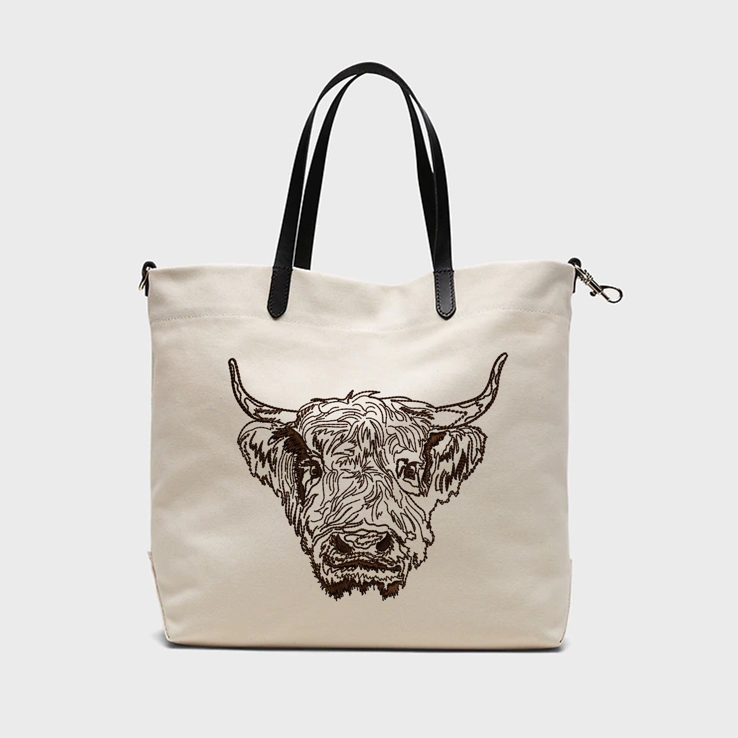 Scottish Highland Cow Machine Embroidery Design embroidered on a handbag