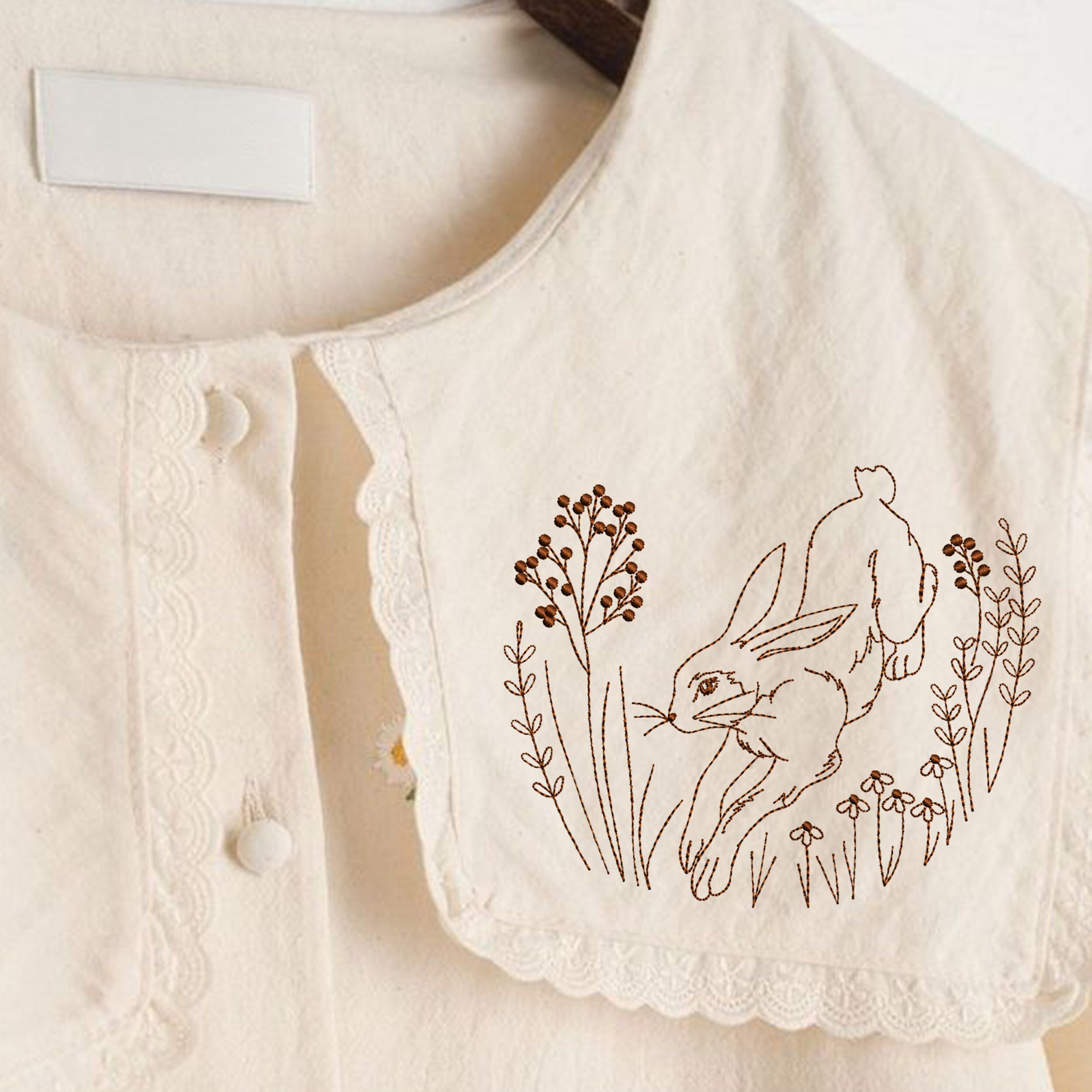 Forest Hare for Machine Embroidery embroidered on a blouse lapel