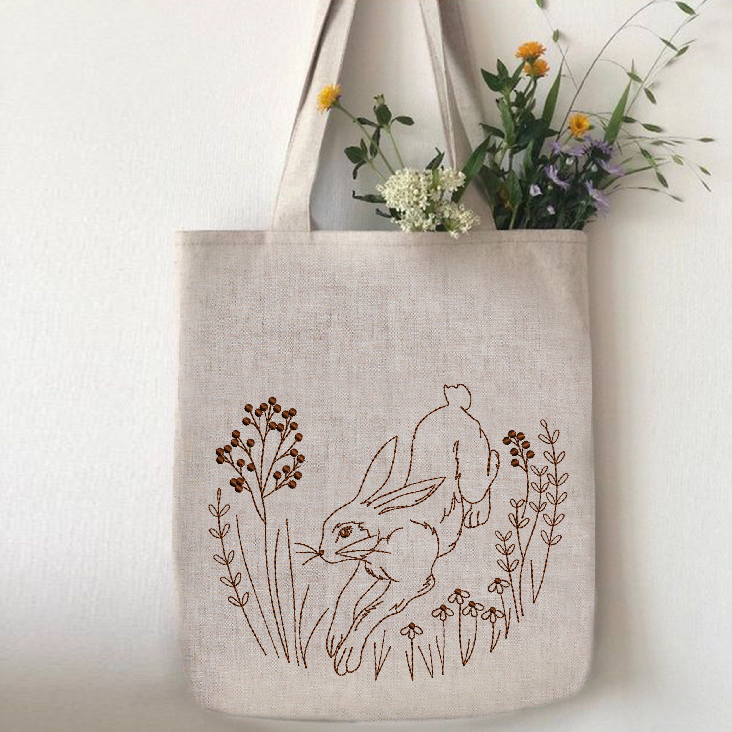 Forest Hare for Machine Embroidery embroidered on a handbag