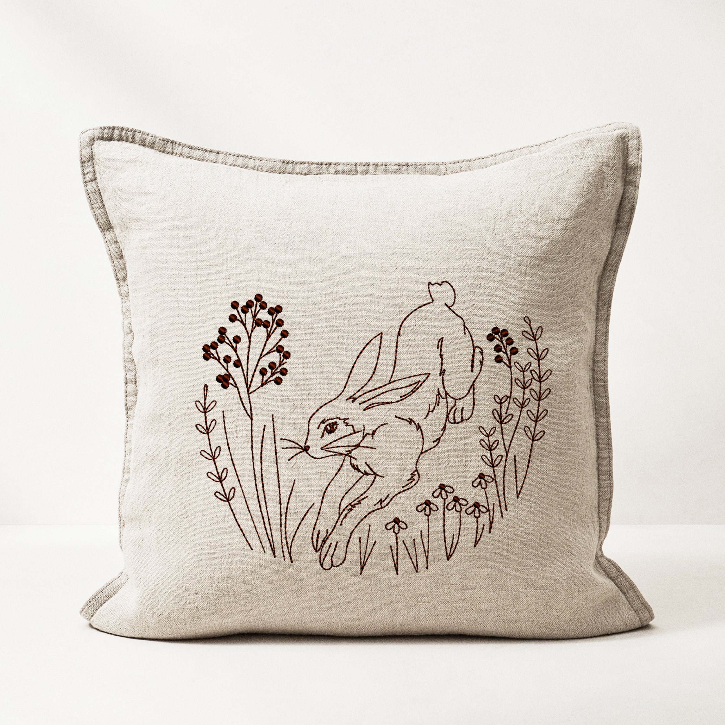 Forest Hare for Machine Embroidery embroidered on a pillow
