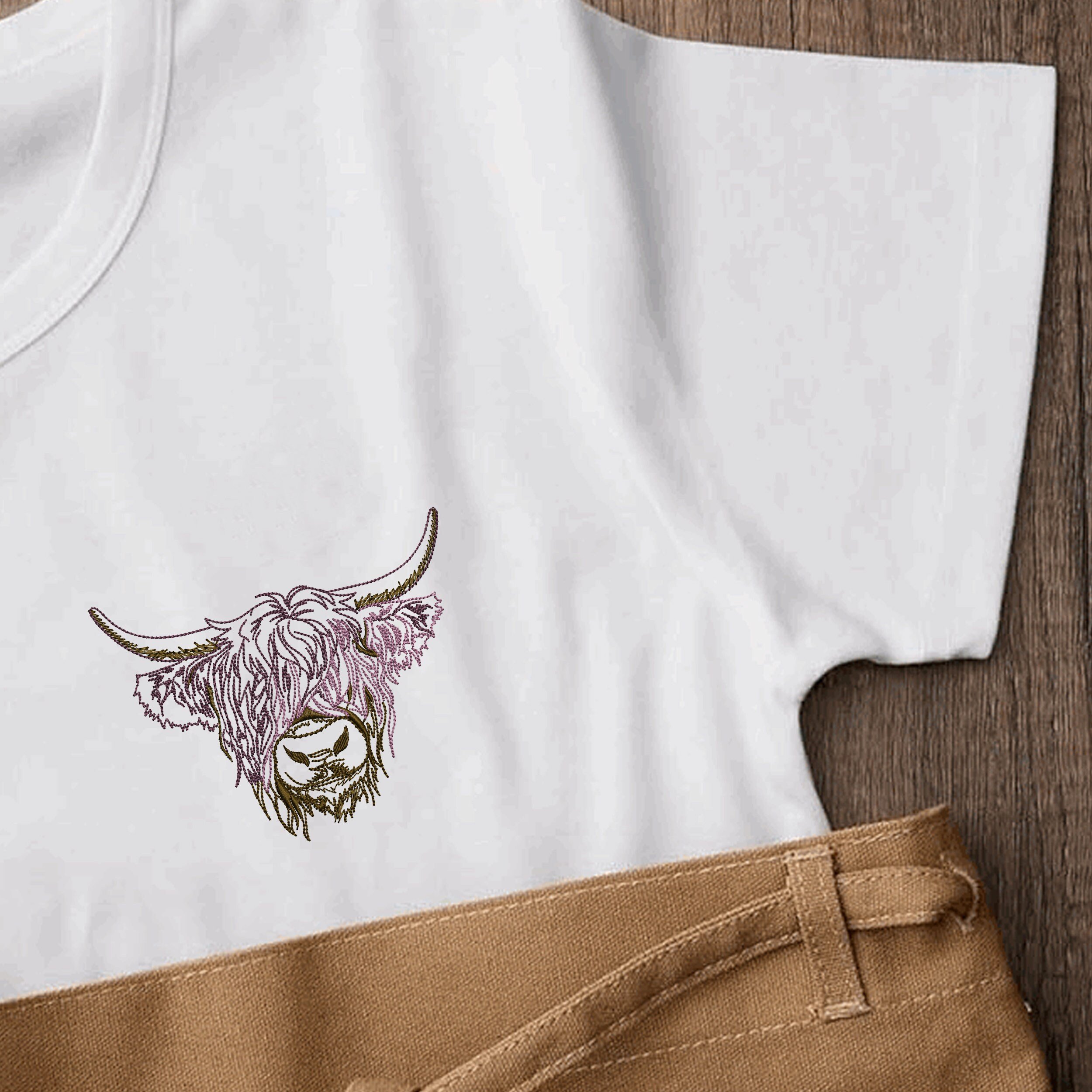 Scottish Highland Cow Machine Embroidery Design ZIP File embroidered on a t-shirt