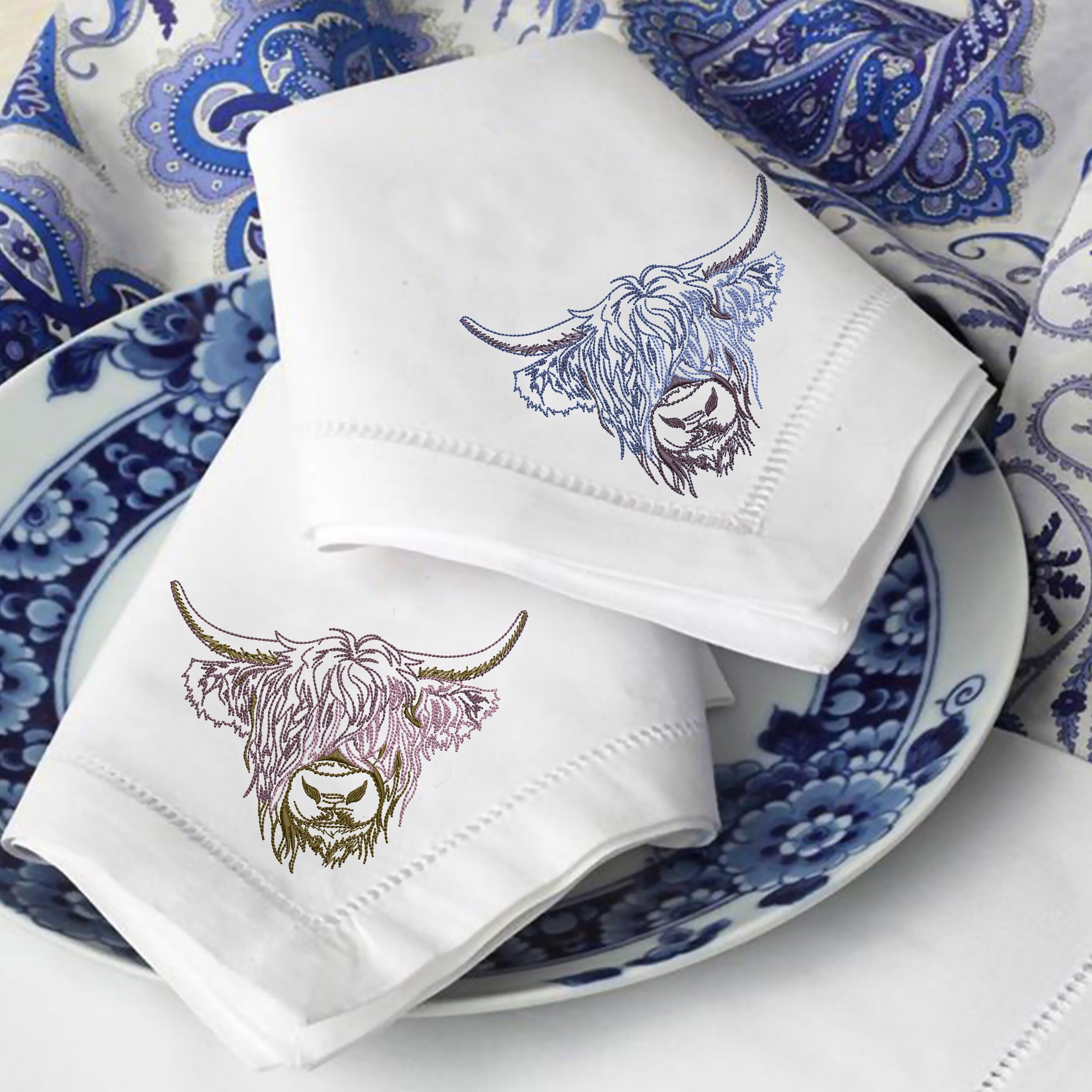 Scottish Highland Cow Machine Embroidery Design ZIP File embroidered on a napkin set