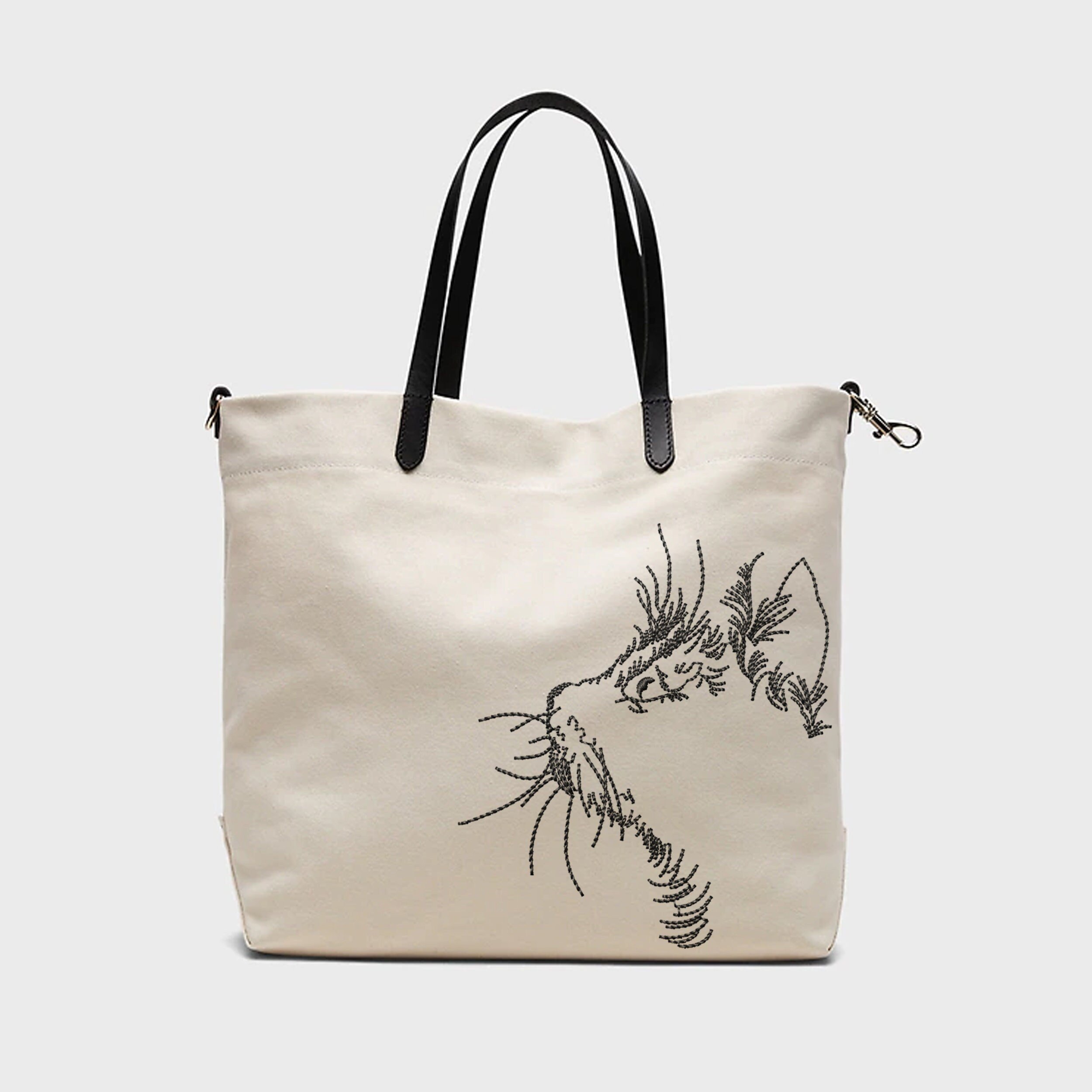 Cat Machine Embroidery Design embroidered on a handbag