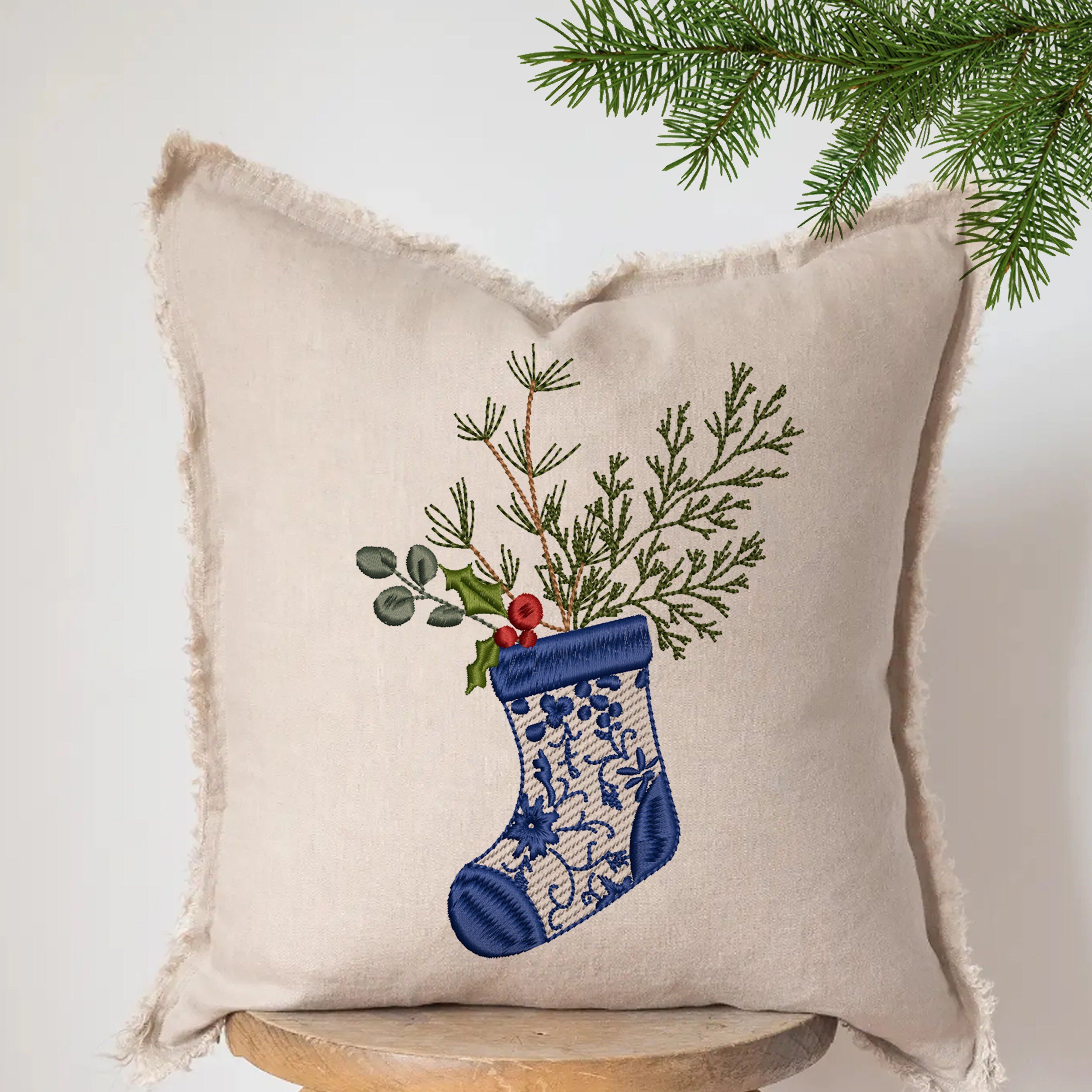 Chinoiserie Christmas Tree Stocking Machine Embroidery Design embroidered on a pillow